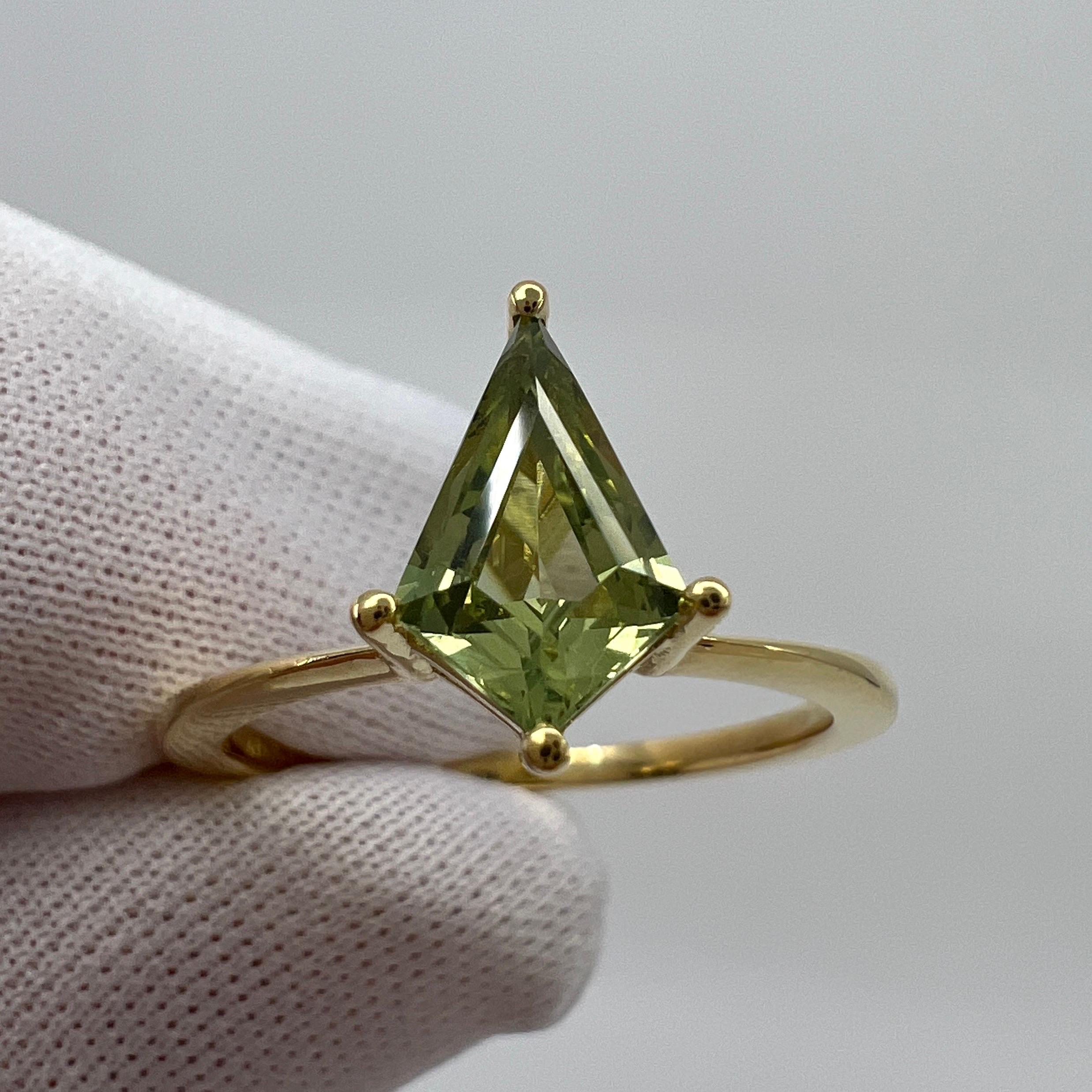Mint Green Sapphire Fancy Kite Cut 18k Yellow Gold Modern Solitaire Ring.

1.13 Carat sapphire with a unique fancy kite cut and stunning light 'mint' green colour.

Set in a beautiful and delicate modern ring. 18k yellow gold.

Ring size UK N - US 7