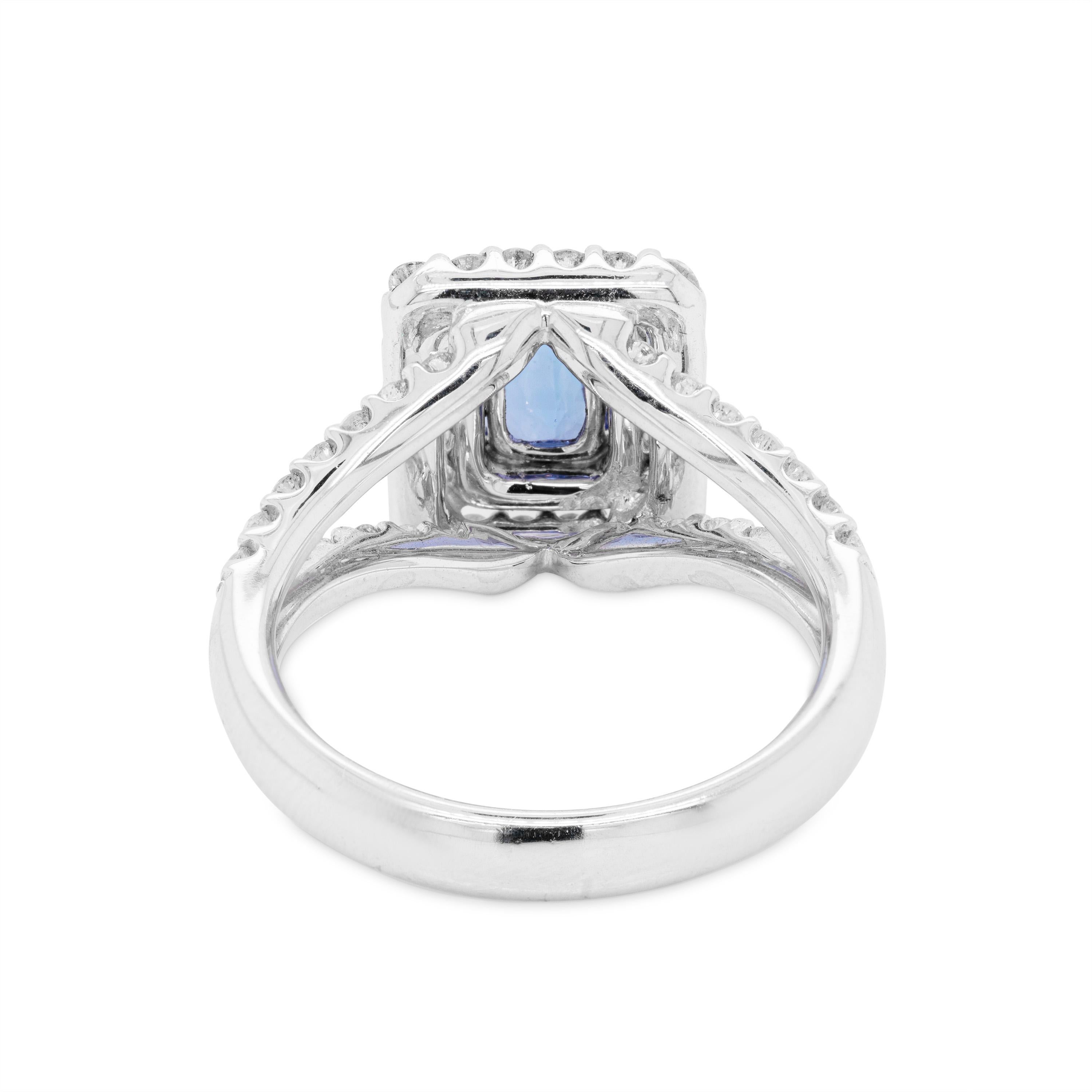 Modern 1.13ct Tanzanite 18 Carat White Gold Diamond Cluster Engagement Ring For Sale