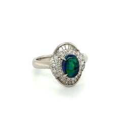 1.14 Carat Black Opal and Diamond Double Halo Vintage Platinum Cocktail Ring