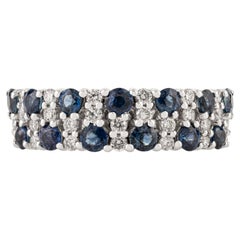 1.14 Carat Blue Sapphire
Diamond Half Eternity Band Ring in 18K White Gold