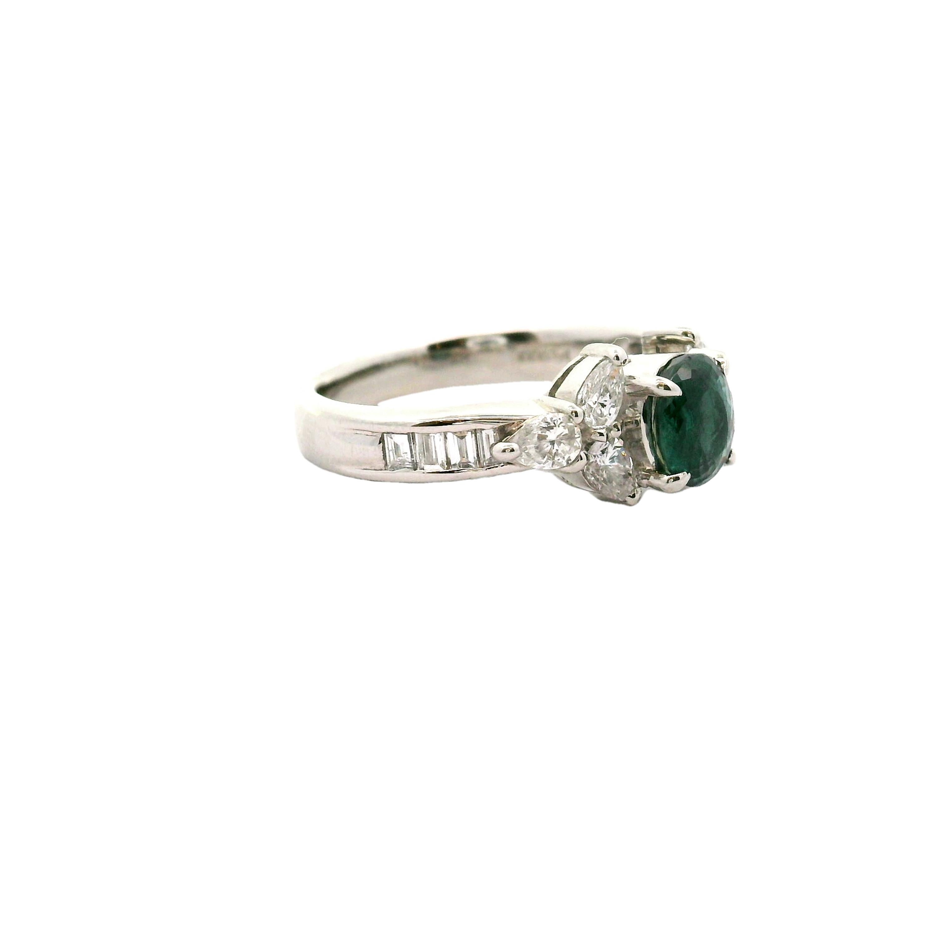 An exquisite 1.14 carat alexandrite is the focal point of this contemporary ring. The alexandrite, in a refined oval cut, displays a captivating and full color-change going from a green-blue color to an intense purple depending on the light source.