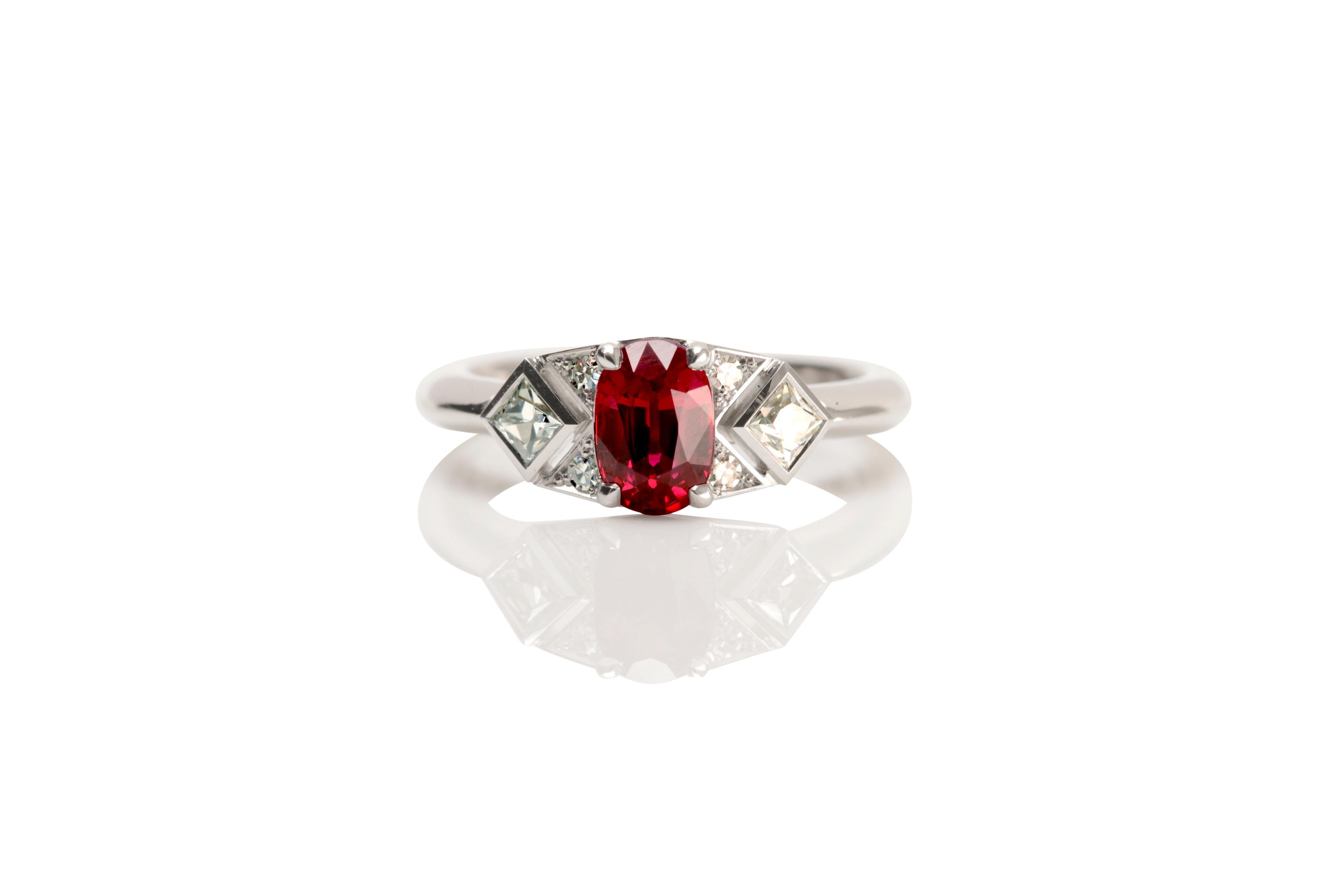 Nicky Burles has long been inspired by Art Deco fine jewellery, this beautiful, handmade, 18 karat white gold ring pays homage to this classic period. A rare, natural Burmese ruby of 1.14 carats sits in the centre in a four claw setting. The ornate
