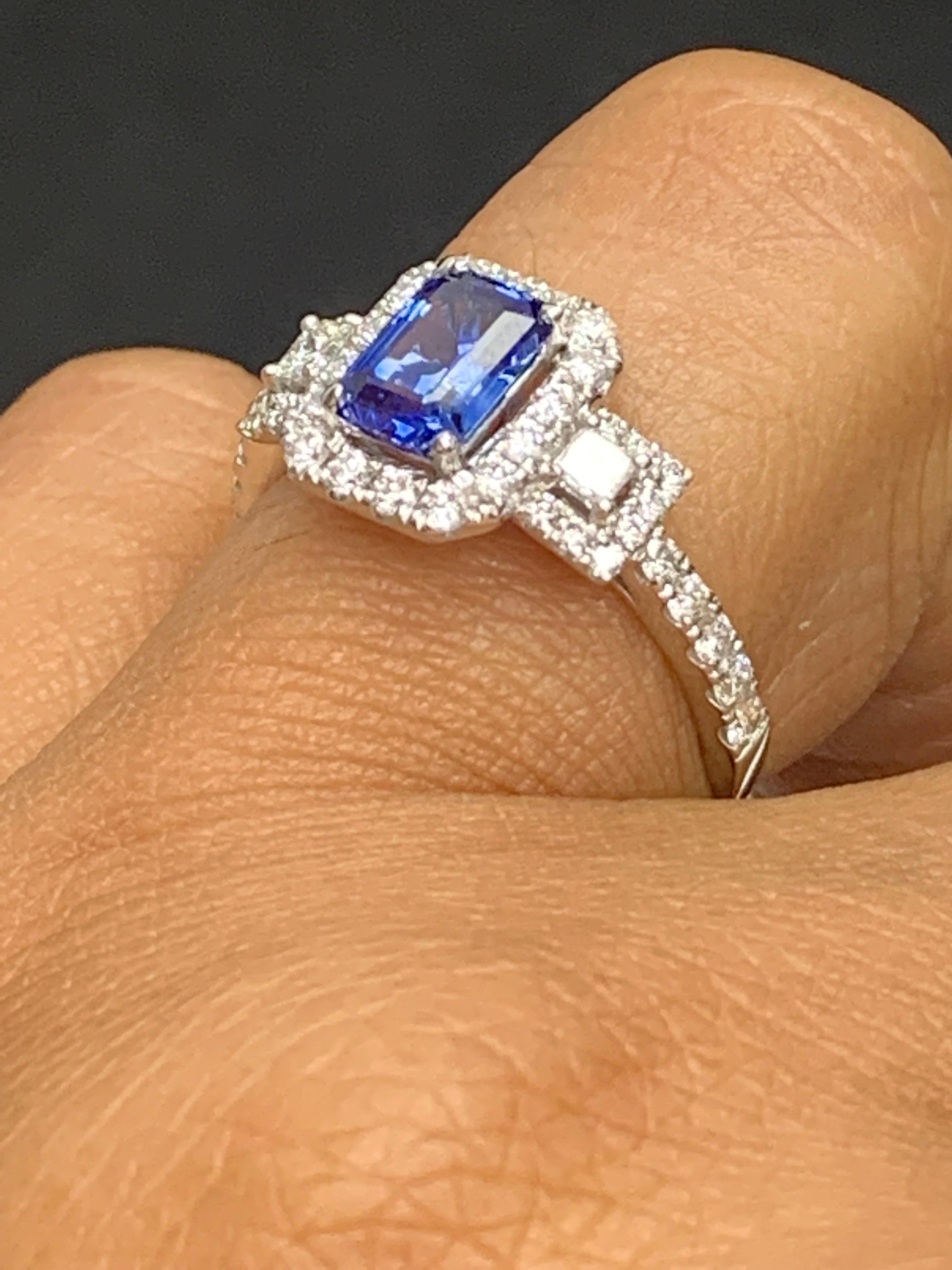 Modern 1.14 Carat Emerald Cut Sapphire and Diamond Halo Ring in 18K White Gold For Sale