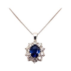 1.14 Carat Oval Cut Blue Sapphire and Diamond Pendant in 18K White Gold
