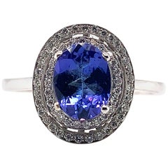 tanzanite ting 1.14 Carat Oval Shaped Tanzanite Ring in 18 Karat White Gold with Diamonds