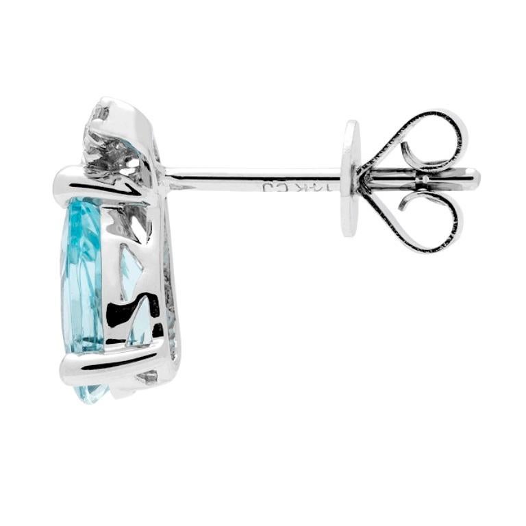 Decórese con elegancia con este pendiente elaborado en oro blanco de 14 quilates por Gin & Grace Earring. Este pendiente está compuesto por aguamarina talla pera (2 piezas) de 1,14 quilates y diamante blanco talla redonda (12 piezas) de 0,06