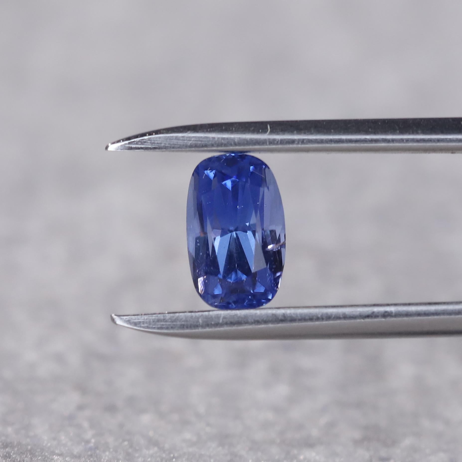 Blue sapphires come in a myriad of hues, each with its unique charm and distinctive beauty. Some tones of blue, like the medium-deep cornflower color of this natural sapphire are like portals to the cosmos. Surreal and breathtaking. Fashioned into a