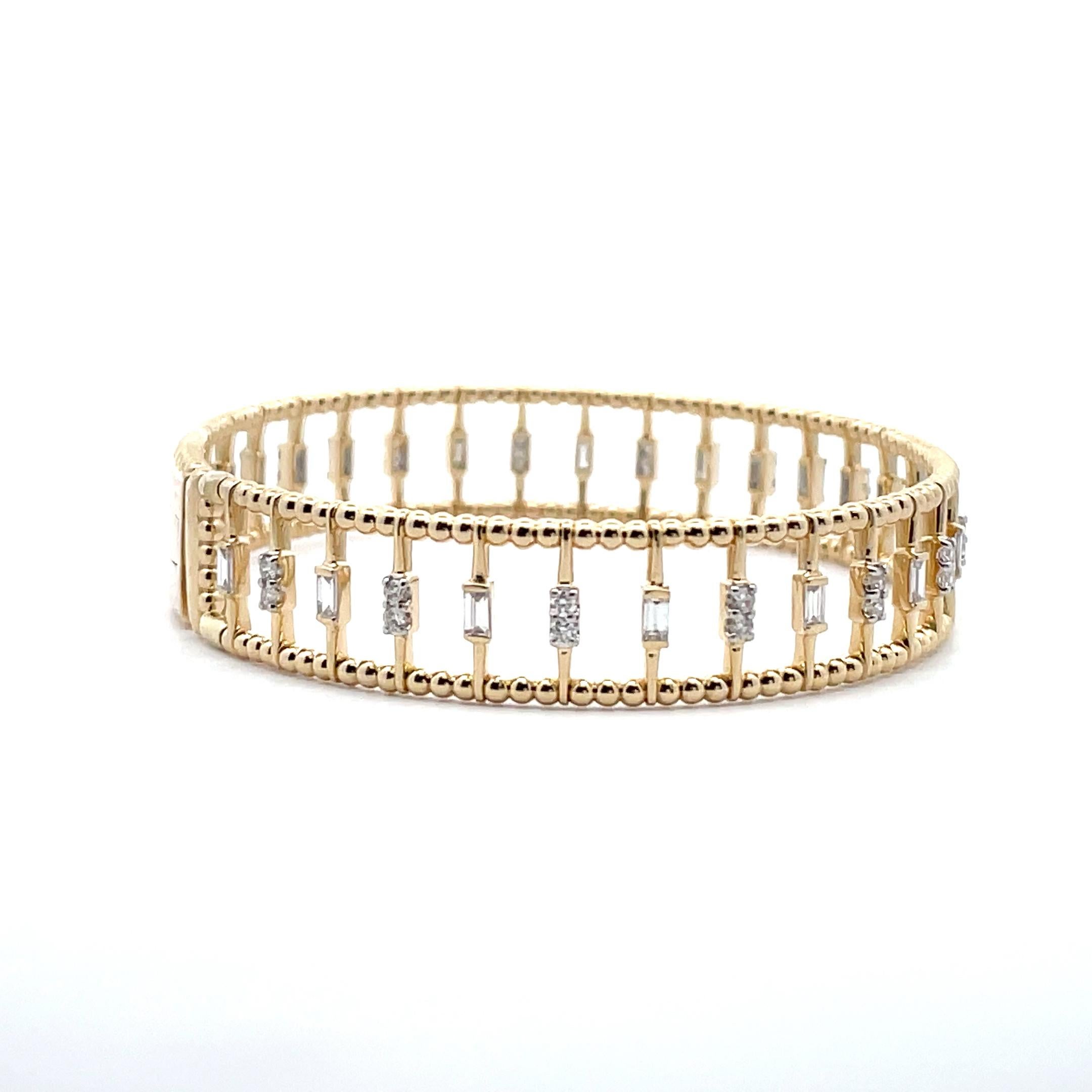 Delicate yet bold, our 1.14 ct. Baguette & Round Diamond Gold Beaded Cage Bangle is the perfect balance of both. Handcrafted by a professional artisan, this beautiful piece arrives ready to wear in its elegant gold box. This timeless piece makes an