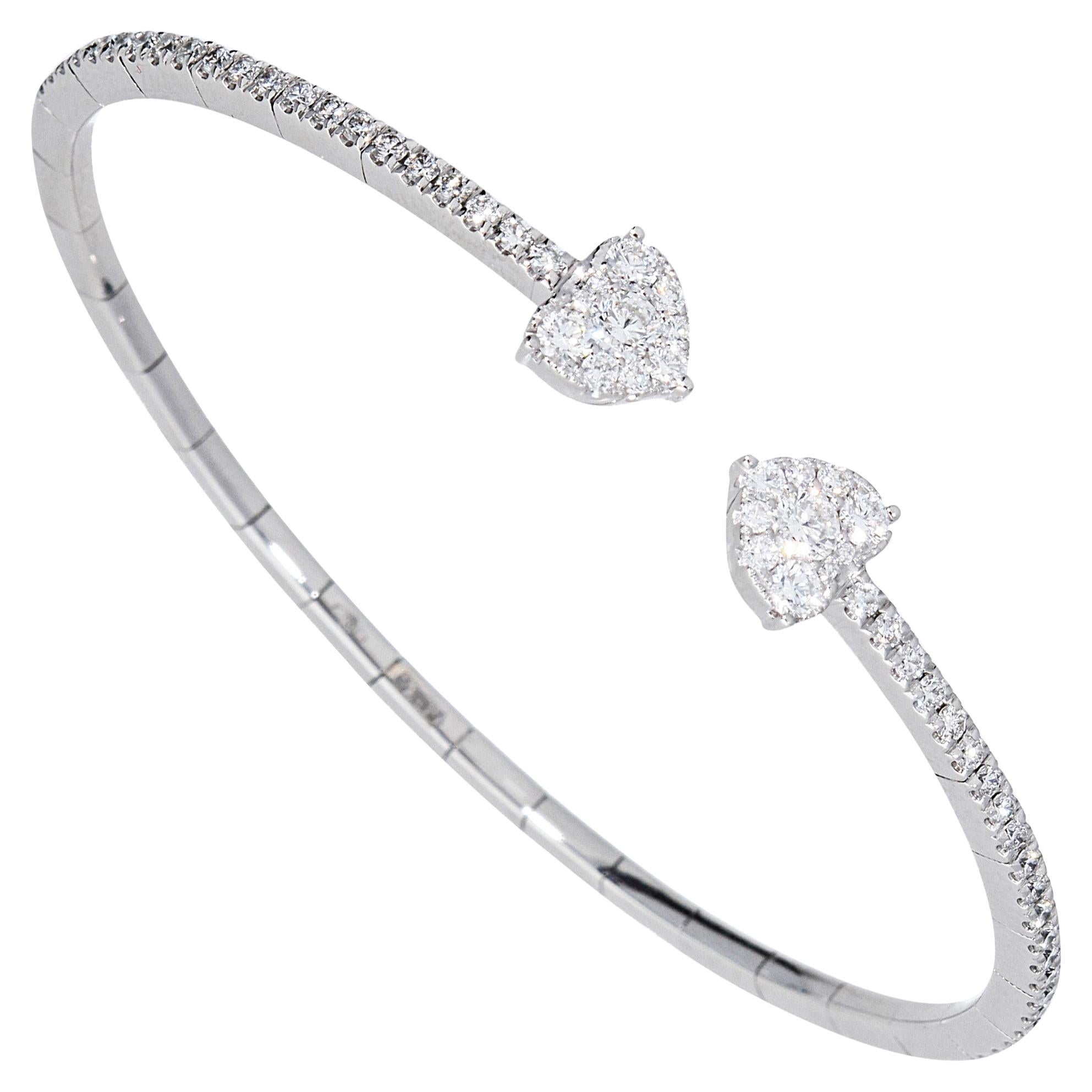 1,14 carati di diamanti su un bracciale rigido con terminazioni a cuore in oro 18Kt Made in Italy