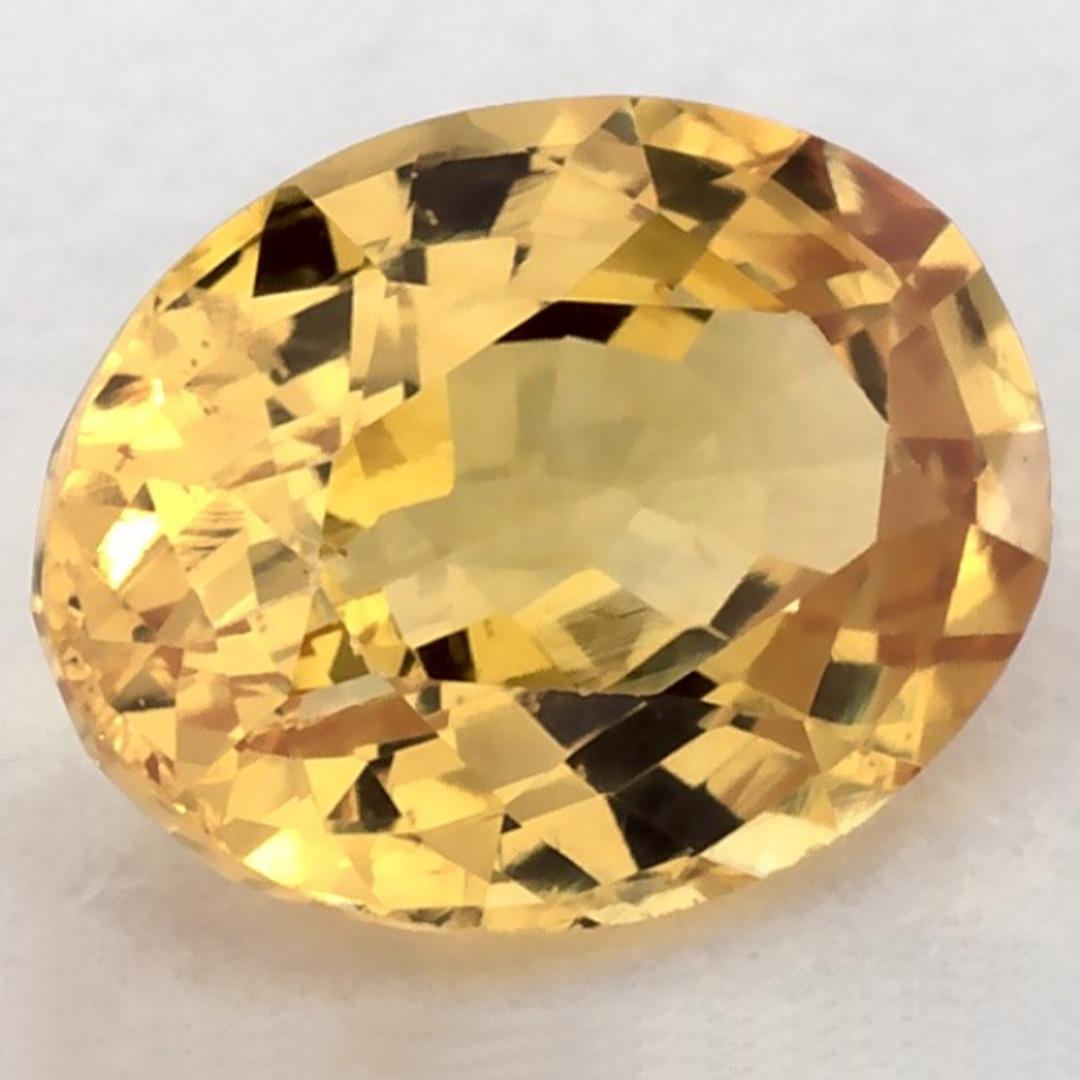 This natural Yellow sapphire offers elegance and sophistication. With its rich color saturation and precise cutting, it is the perfect centerpiece for an engagement ring or luxury jewelry design.

This sapphire originates from Sri Lanka (Ceylon),