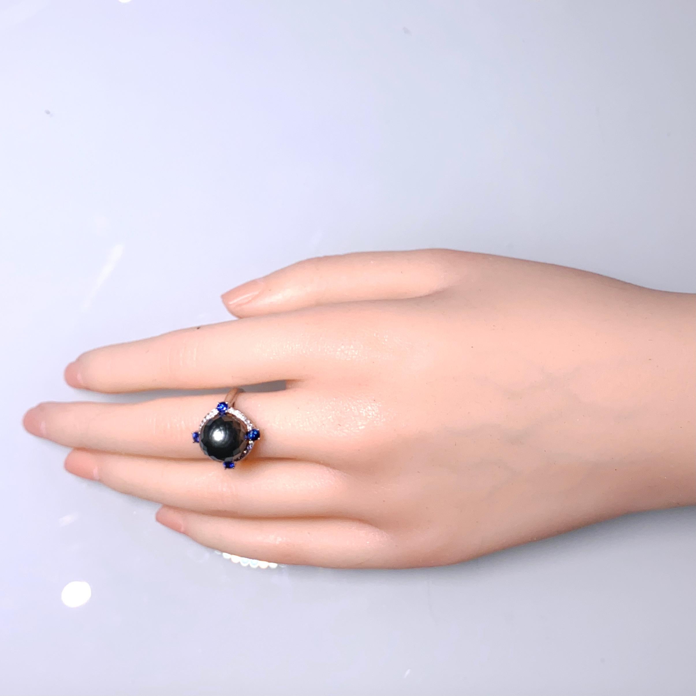 Contemporary Eostre Faceted Black Tahitian Pearl, Sapphire and Diamond White Gold Ring For Sale