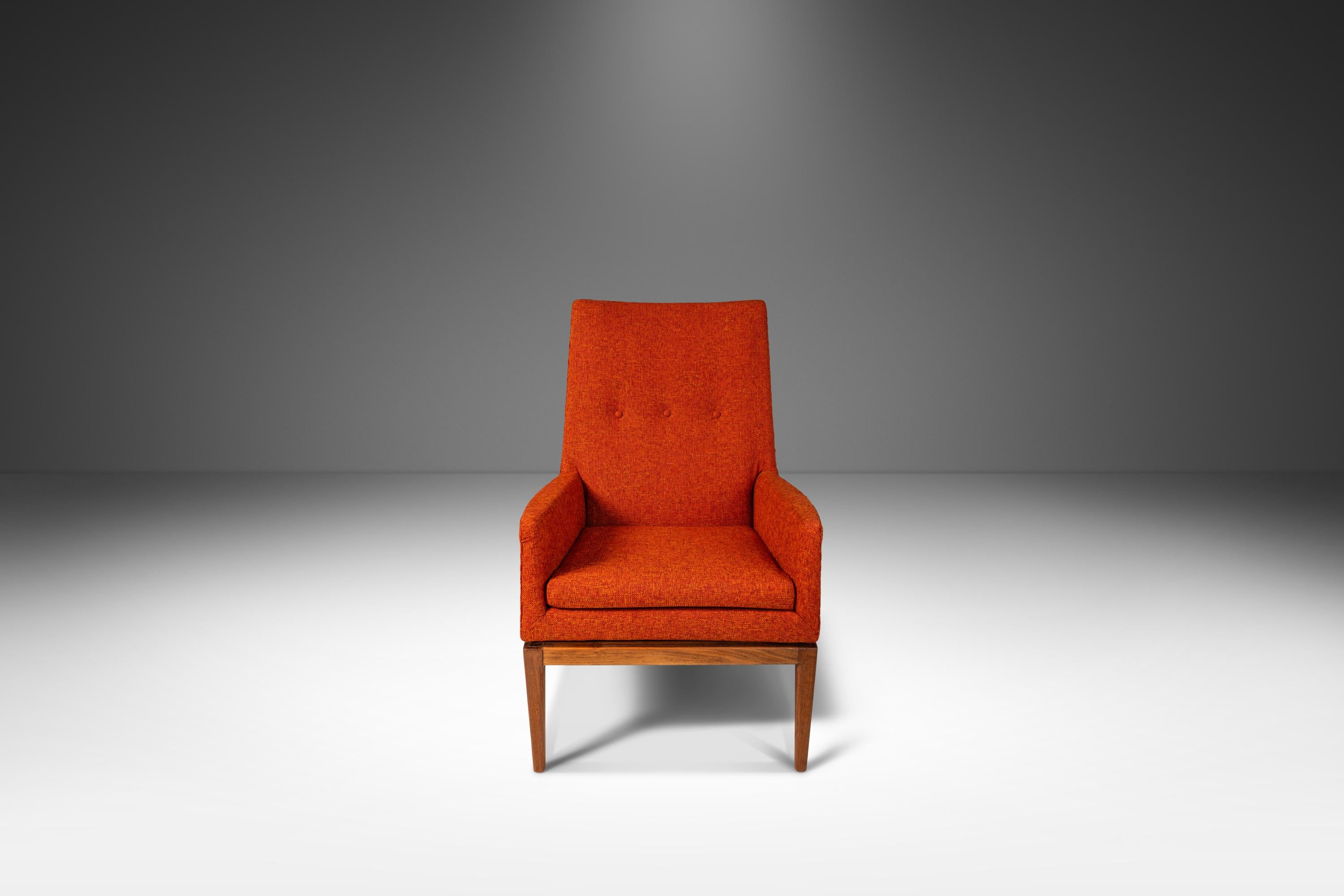 Introducing a rare, fully restored Model 1140 high-back lounge chair designed by the influential Jens Risom. This iconic 1140 features new upholstery, redone in a fabulous vintage-styled heavy weight burnt orange tweed, which was meticulously sewn