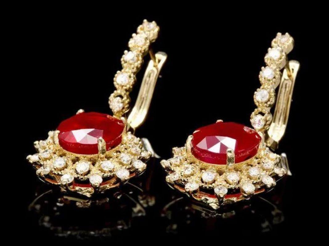 11.40Ct Natural Ruby and Diamond 14K Solid Yellow Gold Earrings

Total Natural Rubies Weight: Approx.  9.90 Carats

Natural Ruby Measures: Approx. 11 x 9 mm

Ruby Treatment: Fracture Filling

Total Natural Round Cut Diamonds Weight: Approx.  1.50