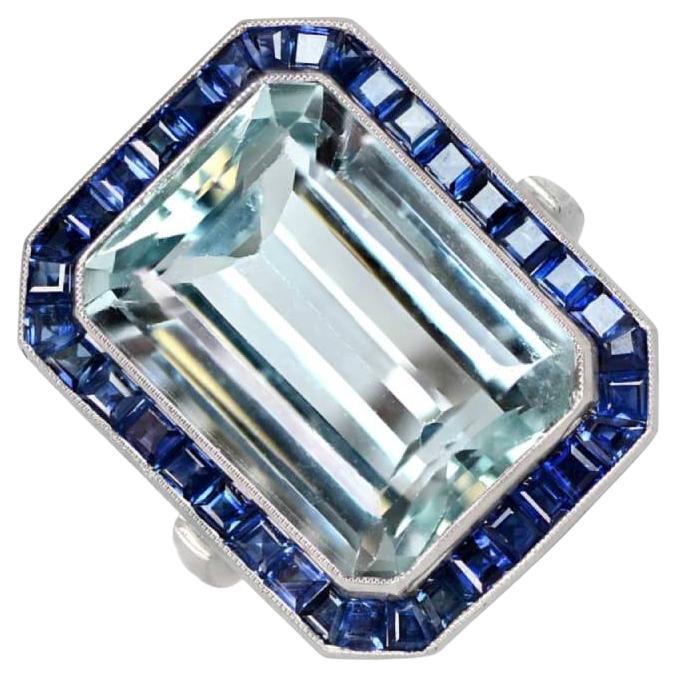 11.41 Karat Aquamarin-Cocktailring mit Smaragdschliff, Saphir-Halo, Platin