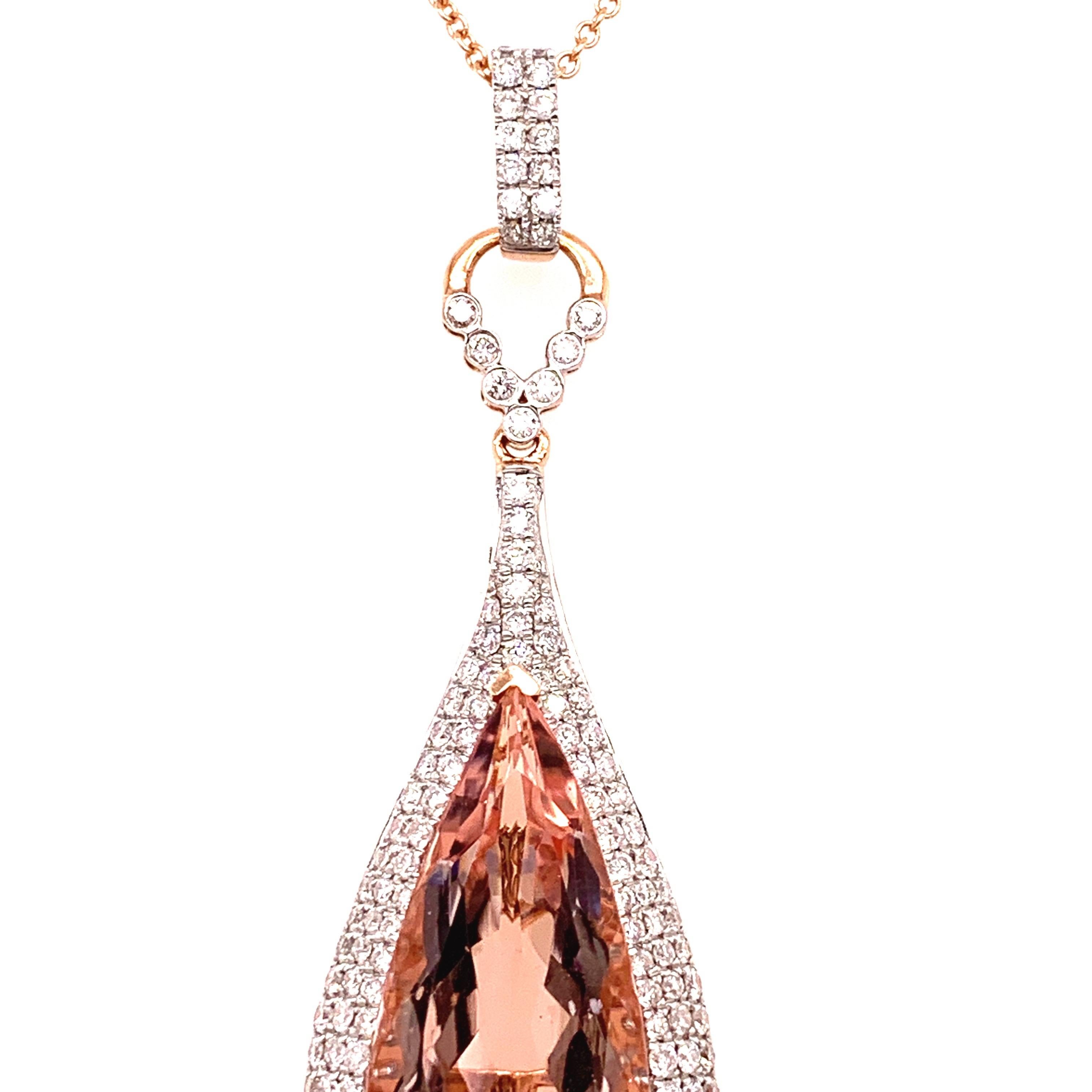 Elegant morganite diamond pendant. High lustre, transparent, pear brilliant-cut, natural salmon-pink, 11.44 carats morganite, encased in closed basket mounting with one split prong and four bead prongs, accented on sides and bale with round