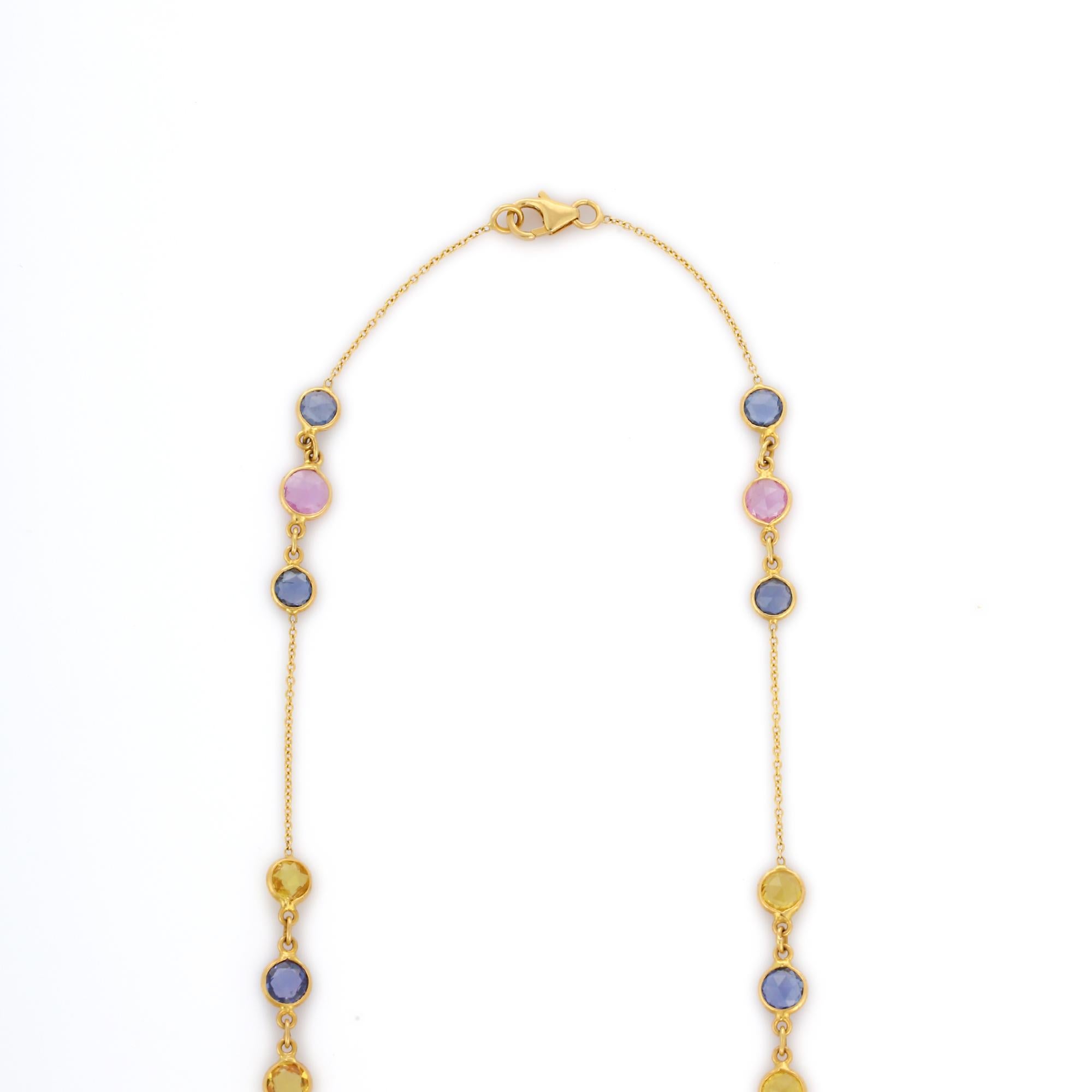 Multi Sapphire Chain Necklace Enhancer in 18K Gold studded with round cut multi sapphire gemstones.
Accessorize your look with this elegant multi sapphire chain necklace enhancer. This stunning piece of jewelry instantly elevates a casual look or