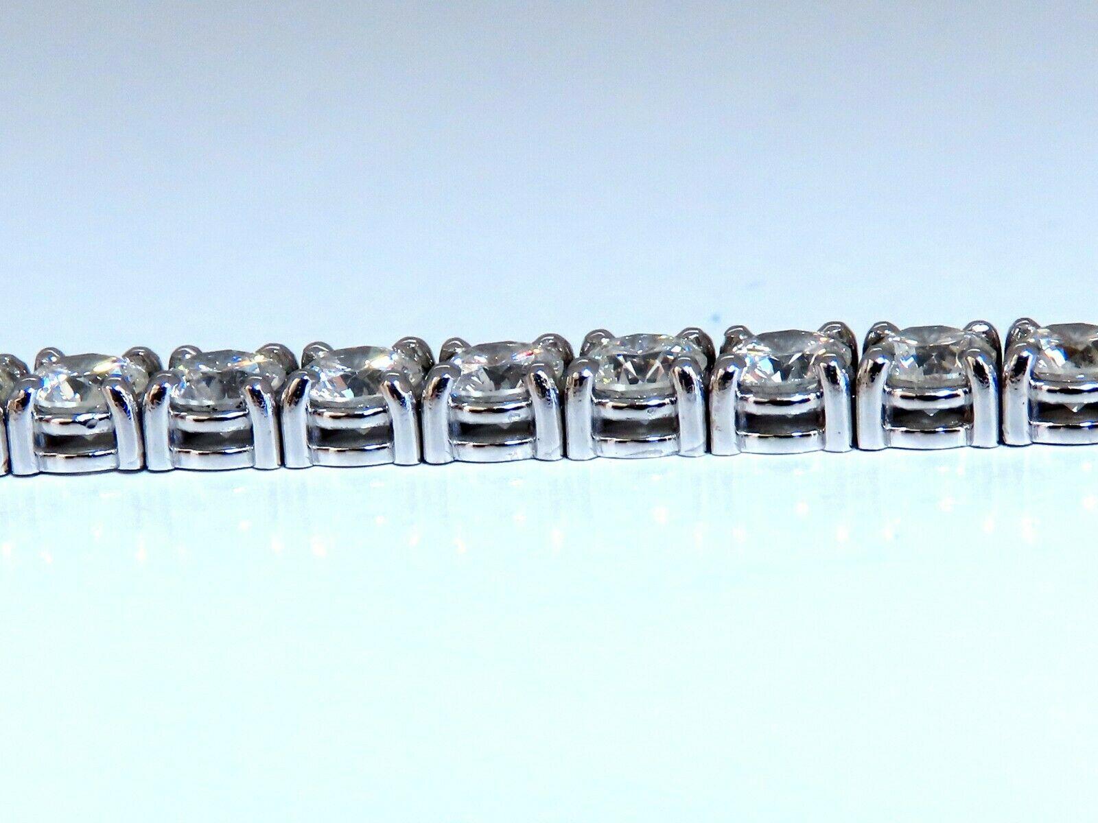 Tennis classico

11.45ct. Naturale  bracciale con diamanti.

Tagli tondi e pieni 

H. H.

Trasparenza Si-2.

oro bianco 14kt 

13,6 grammi.

Larghezza del bracciale: 4,6 mm

7  Lunghezza indossabile in pollici

chiusura di sicurezza/chiusura a