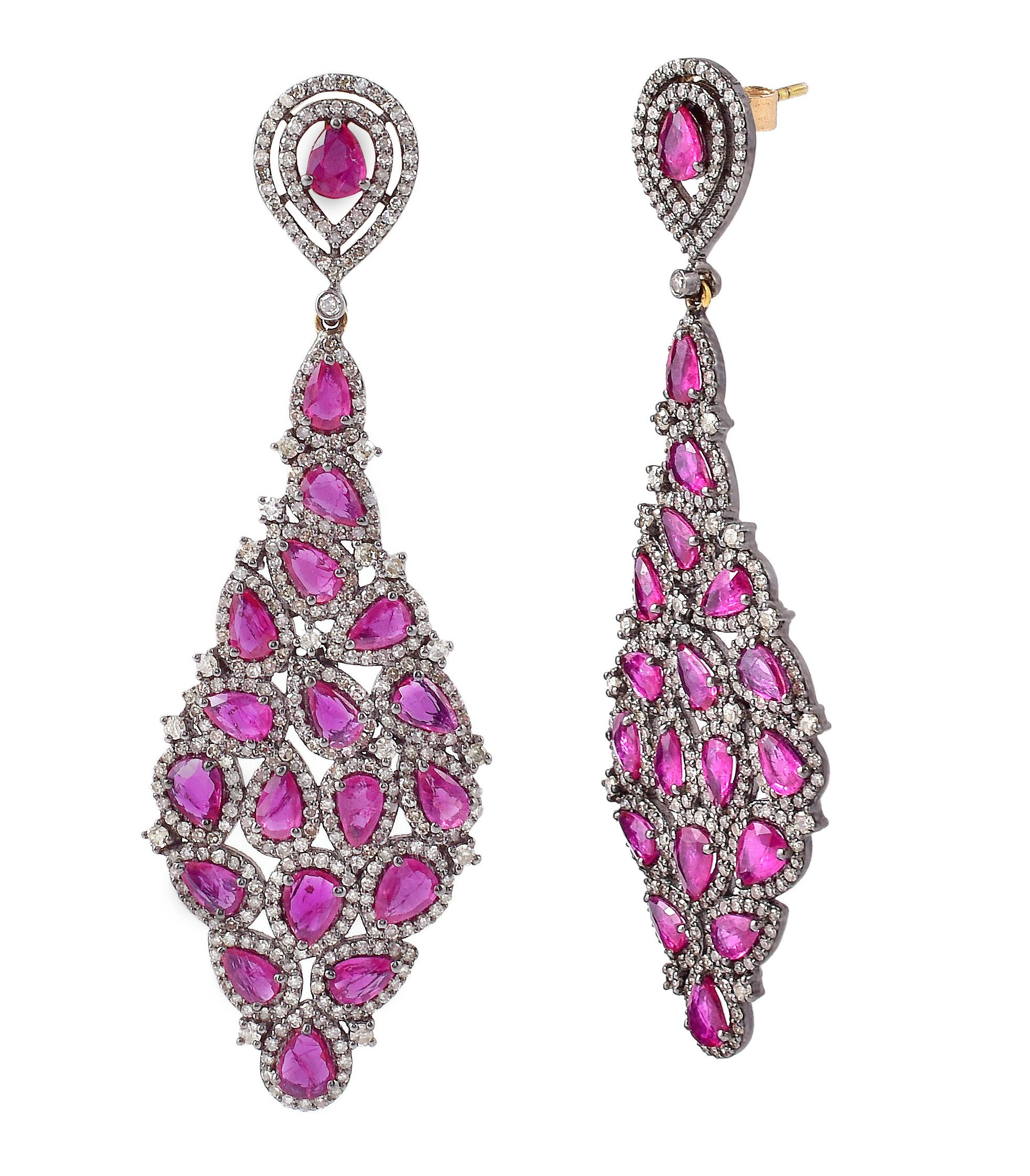11.47 Carat Diamond and Ruby Drop Earrings in Contemporary Victorian Style

This Victorian style scarlet red ruby and diamond long earring is sensational. The bottom teardrop is formed with the exquisite combination of solitaire pear rubies