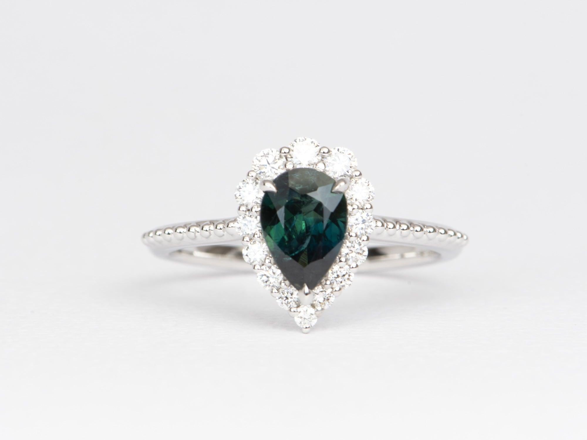 teal blue diamond engagement ring