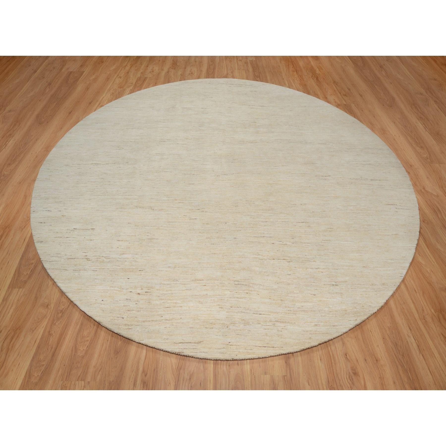 Parchment White, Hand Knotted, Modern, Plain Design, Lori Buft Gabbeh, Thick and Plush, Pure Wool, Round, Oriental Rug
Primary materials: Wool
Latex: No Pile height: 0.25 Inches
Style: Contemporary
Primary color: Ivory
Secondary colors: