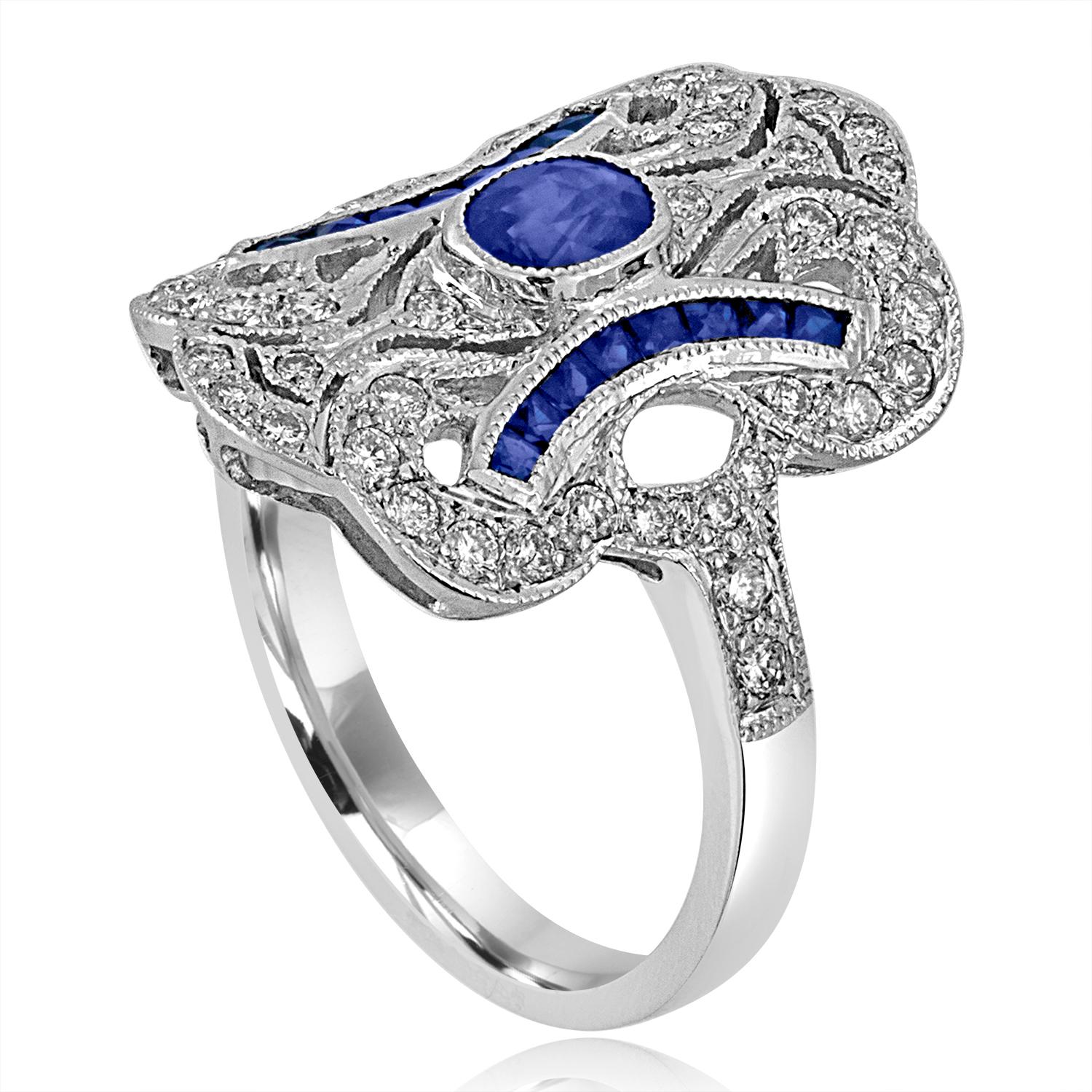 Art Deco Revival Style Ring
The ring is 18K White Gold
There are 0.55 Carats in Diamonds G SI
There are 0.60 Carats in Blue Sapphires
The ring is a size 6.75, sizable
The ring weighs 5.3 grams
