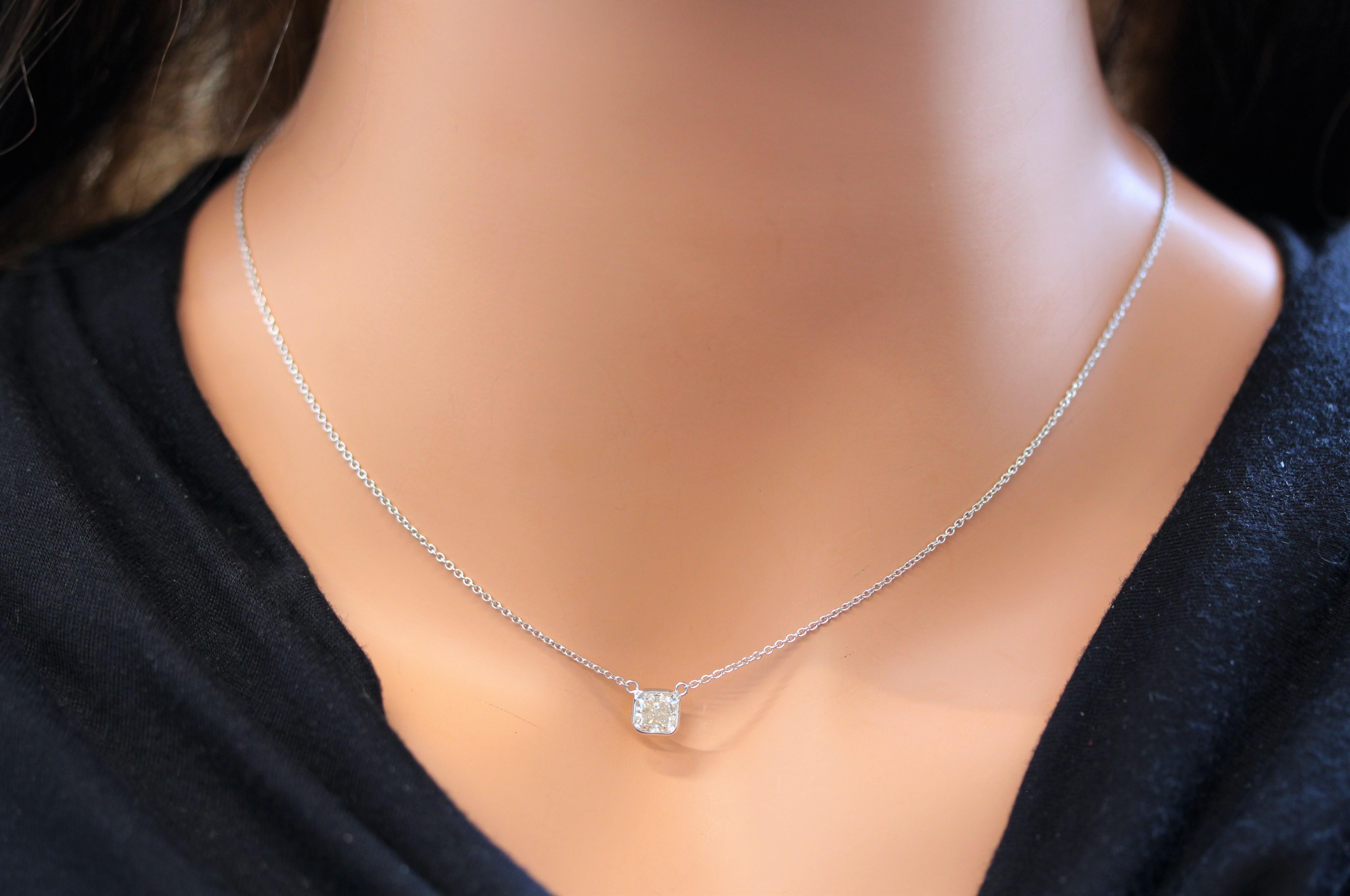 Make a statement worn solo and level up your collar candy when layered. How would you wear it? This is a natural Radiant, color I and clarity SI1 and EGLUSA certified, handmade necklace wire-wrapped in 14k white gold. This is a piece you'll wear