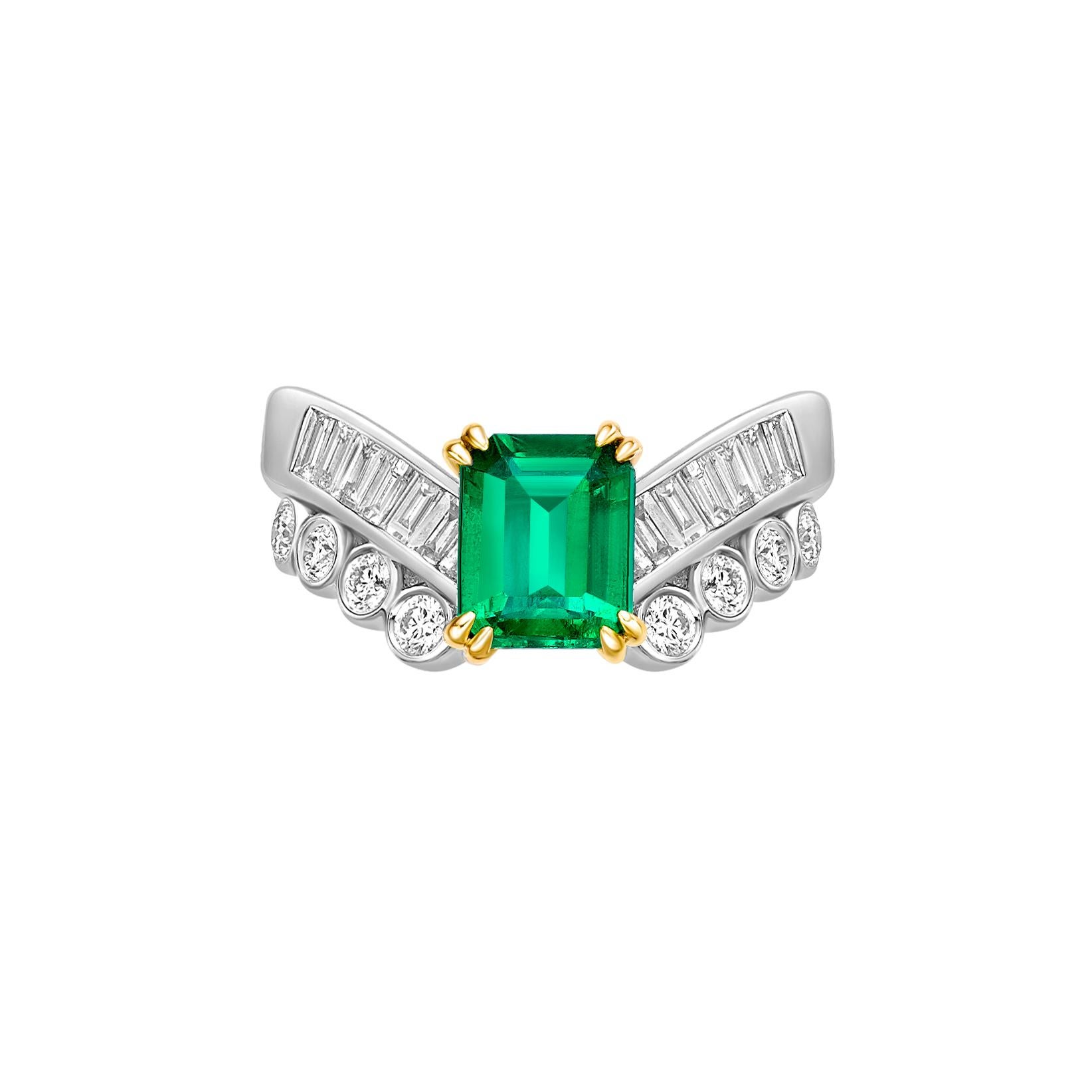 Contemporary 1.15 Carat Emerald Fancy Ring in 18Karat White Yellow Gold with White Diamond. For Sale