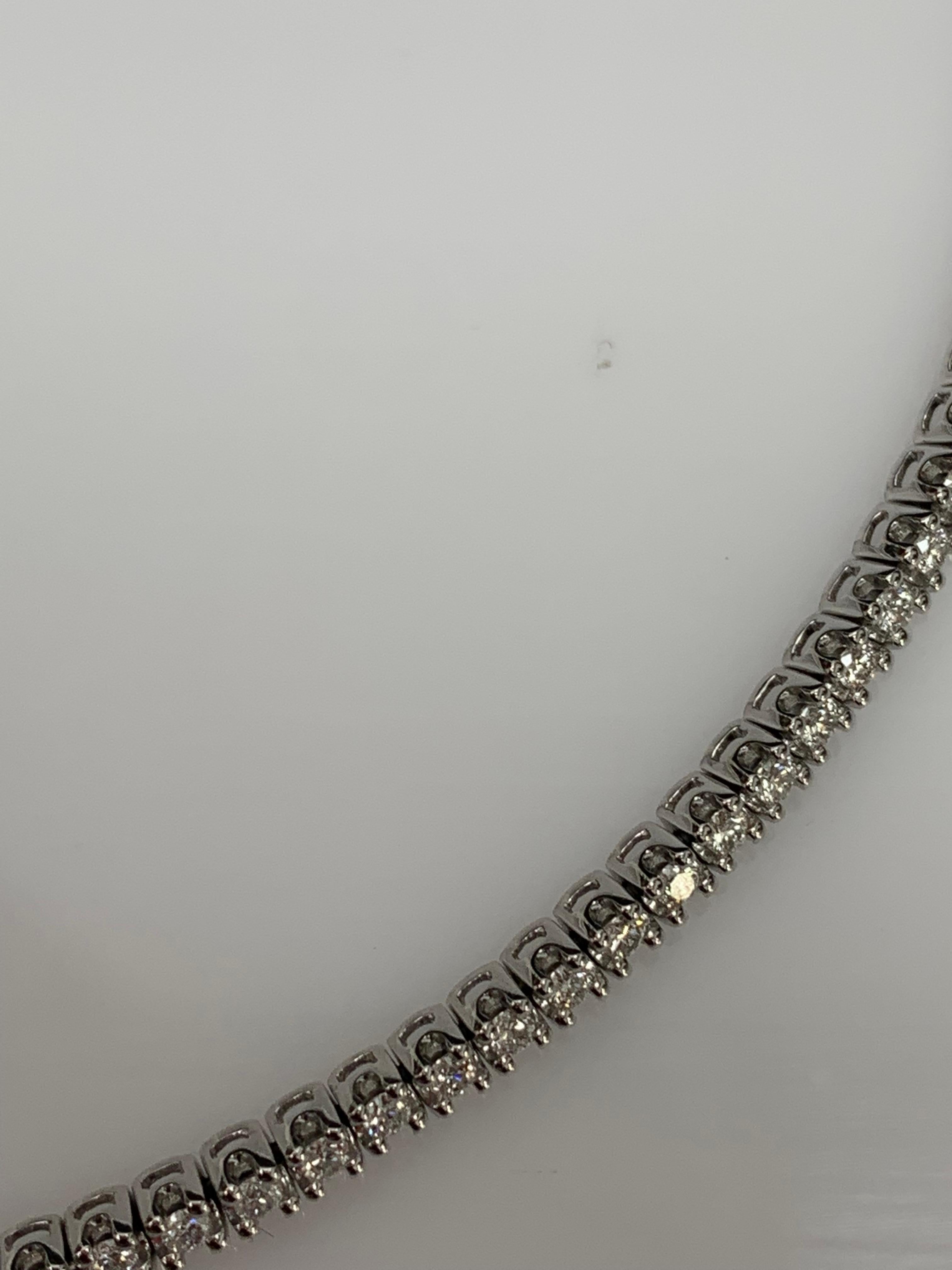 This is a Beautiful Diamond  Choker Collar Necklace that is adjustable for comfort. Crafted of 14K White Gold features 58 brilliant cut Round Diamonds weighing 1.15 carats. The necklace has a chain for different neck sizes. Available in yellow gold