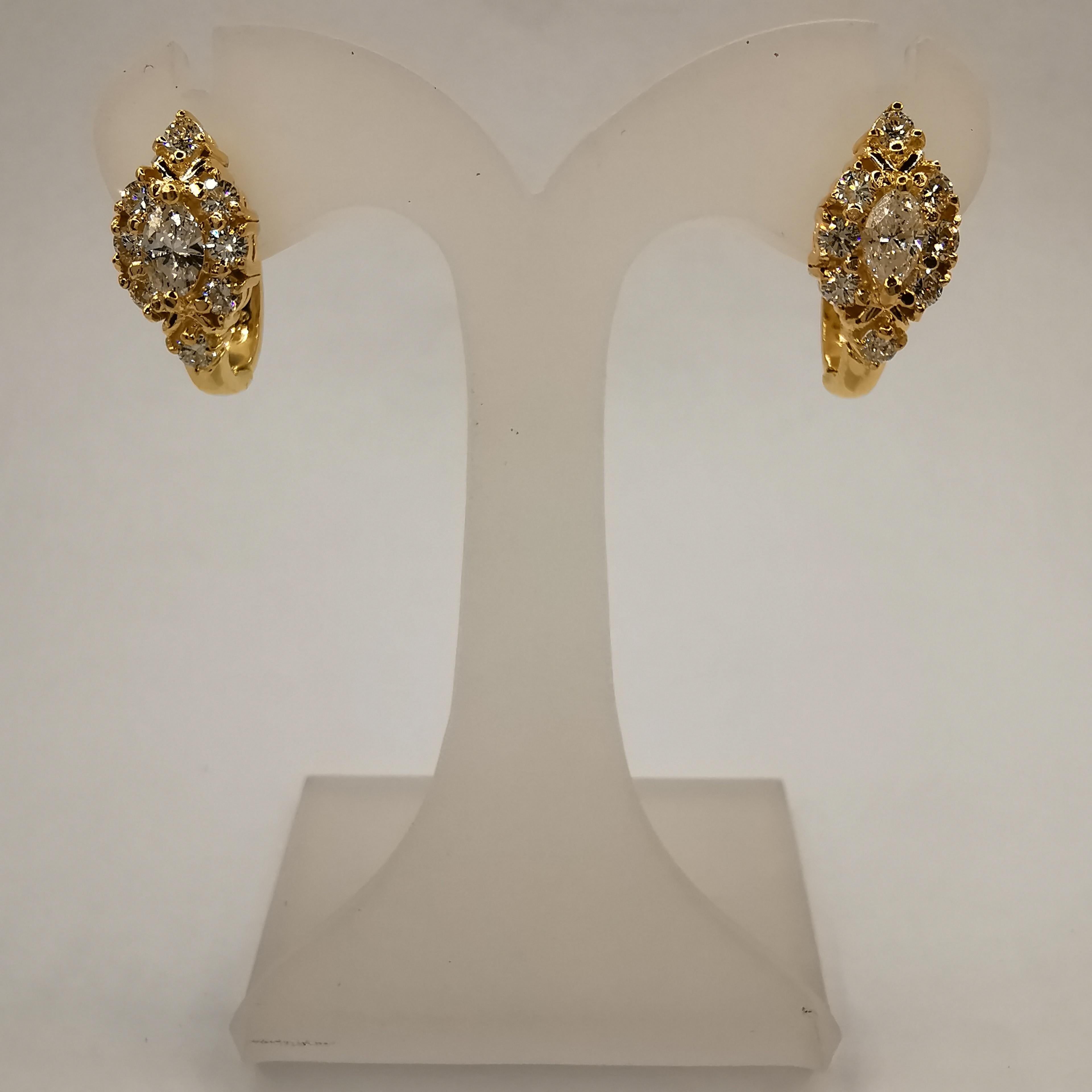 Ces superbes boucles d'oreilles en diamant marquise de 115 carats sont l'accessoire parfait pour toute occasion spéciale. Les boucles d'oreilles sont fabriquées en or jaune 850, dont la pureté est légèrement supérieure à 20k. Elles présentent une