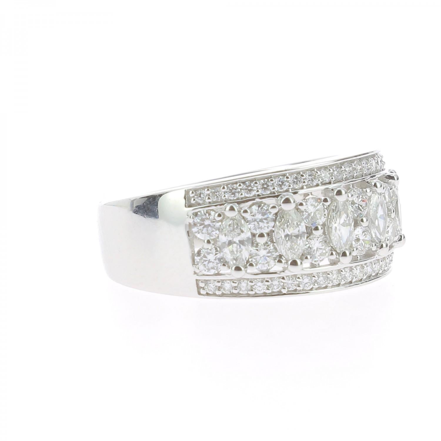 The Lace Ring is a unique and trendy ring set with 1,15 carat.
The ring is paved with brilliants cut diamonds weighing 0.47 Carat and Marquise cut diamonds weighing 0.68 Carat.
Craft in 18K White Gold weighing 6.24 Grams, the ring is set with GVS