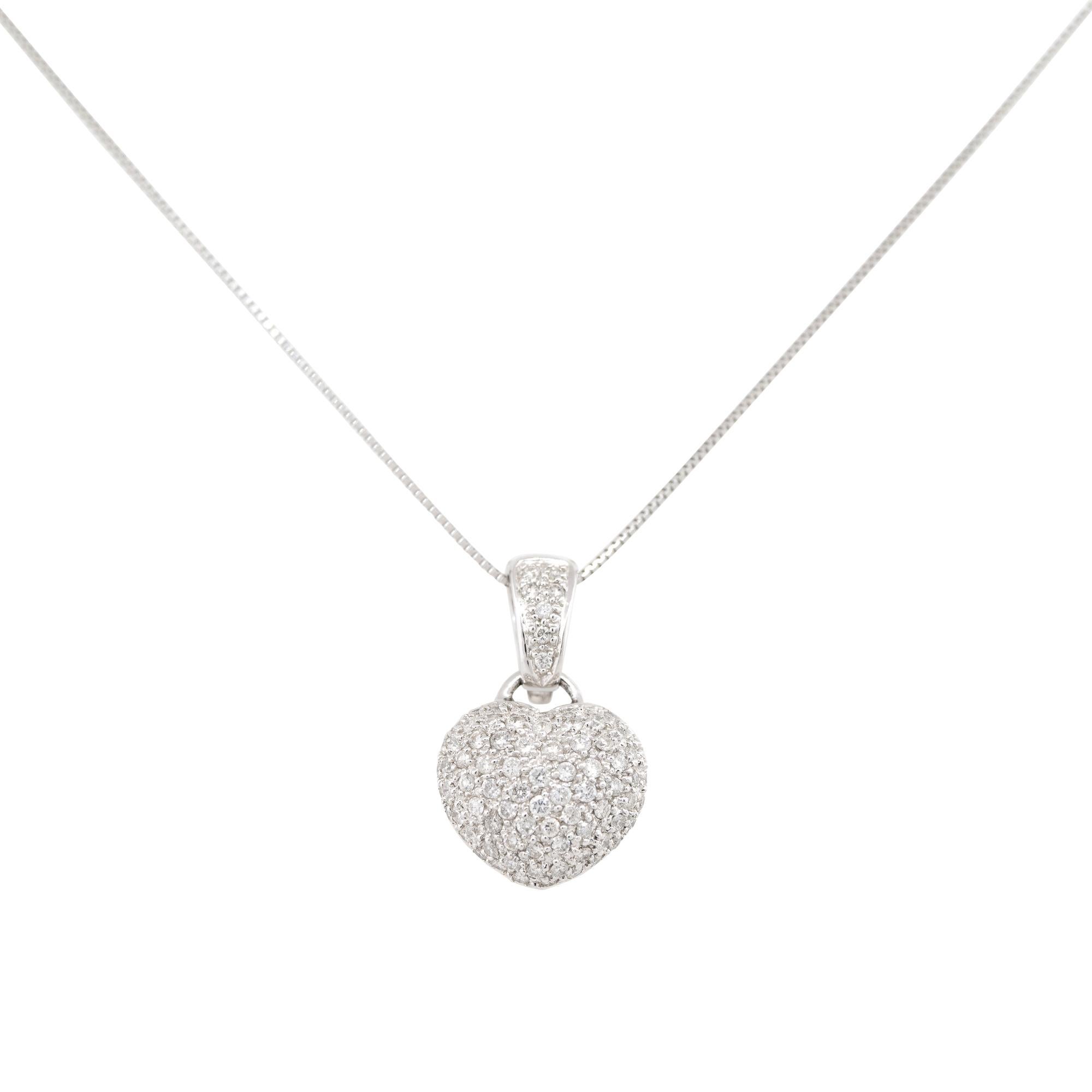 18k White Gold 1.15ctw Mini Pave Diamond Puffed Heart Necklace
Material: Pendant: 18k White Gold, Chain: Platinum
Diamond Details: Approximately 1.15ctw of Pave set, Round Brilliant cut Diamonds. All diamonds are approximately H/I in color and