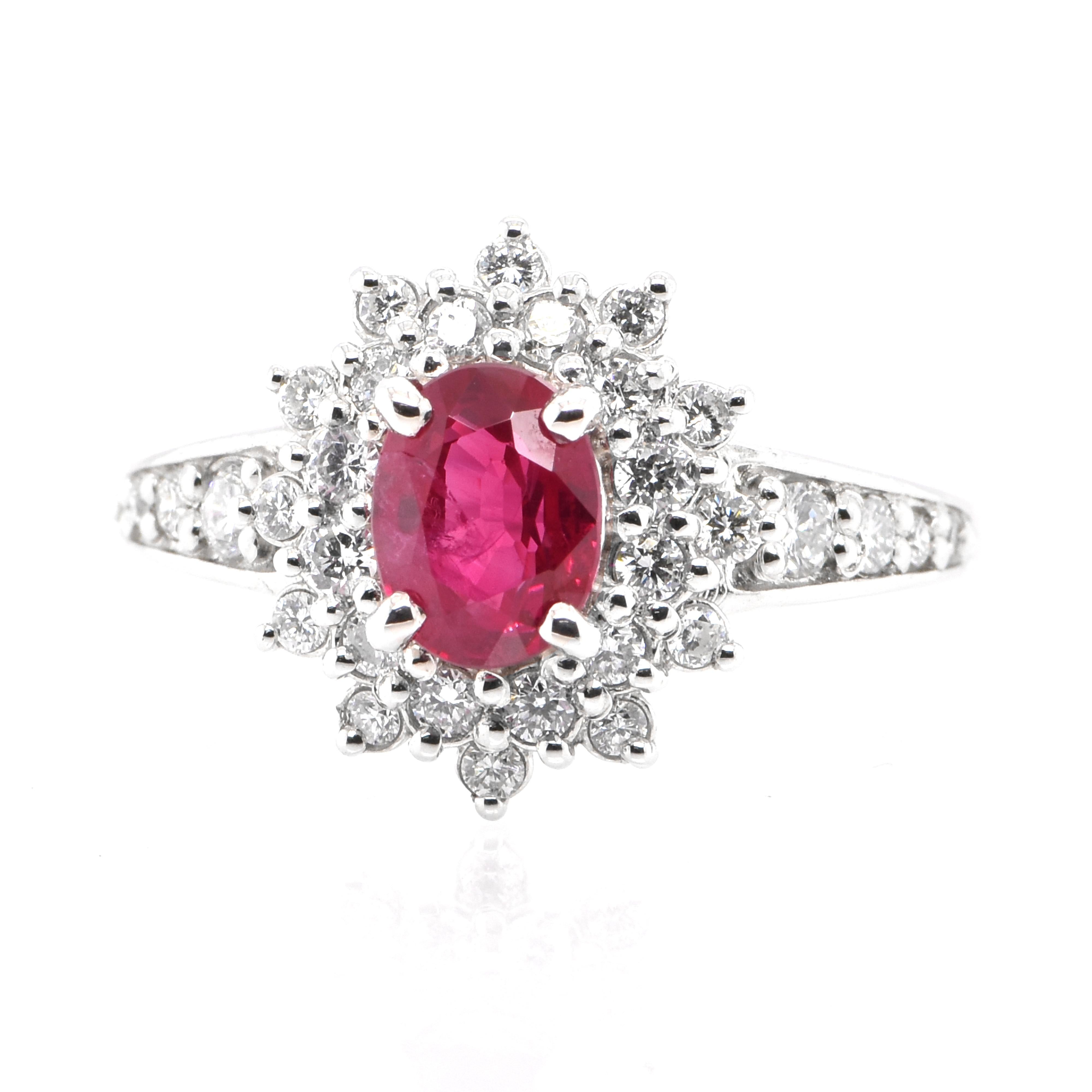 A beautiful ring set in Platinum featuring a 1.15 Carat Natural Ruby and 0.50 Carat Diamonds. Rubies are referred to as 