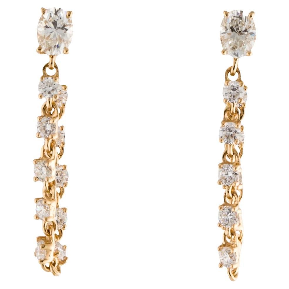 Boucle d'oreille en or 14k avec chaîne à prong et diamant ovale de 1,15 carat en vente