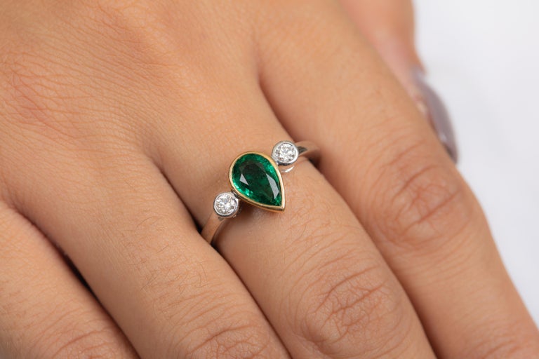 For Sale:  1.15 Carat Pear Shaped Emerald and Diamond Engagement Ring in 18K White Gold  3