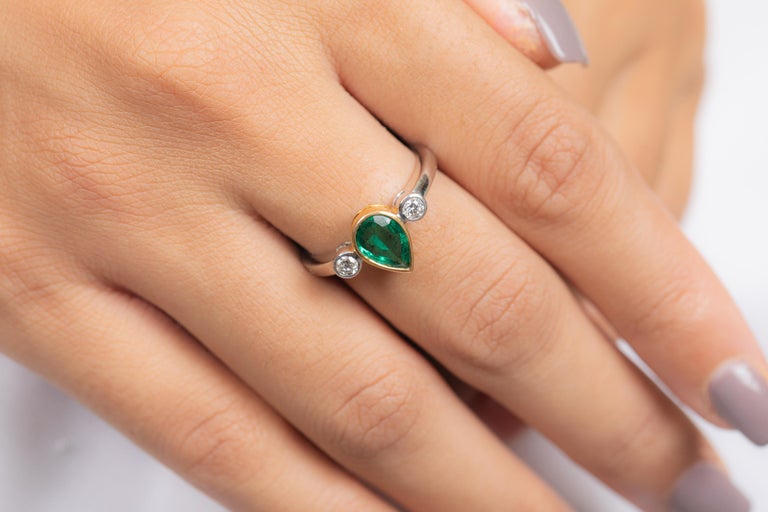 For Sale:  1.15 Carat Pear Shaped Emerald and Diamond Engagement Ring in 18K White Gold  5