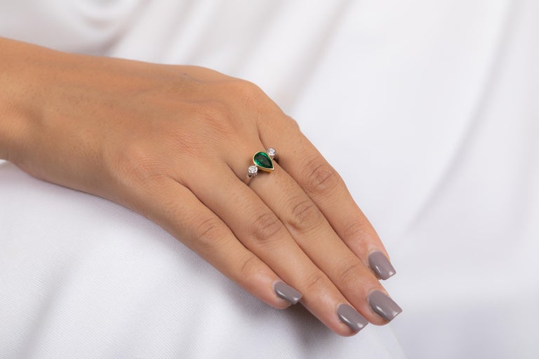 For Sale:  1.15 Carat Pear Shaped Emerald and Diamond Engagement Ring in 18K White Gold  7