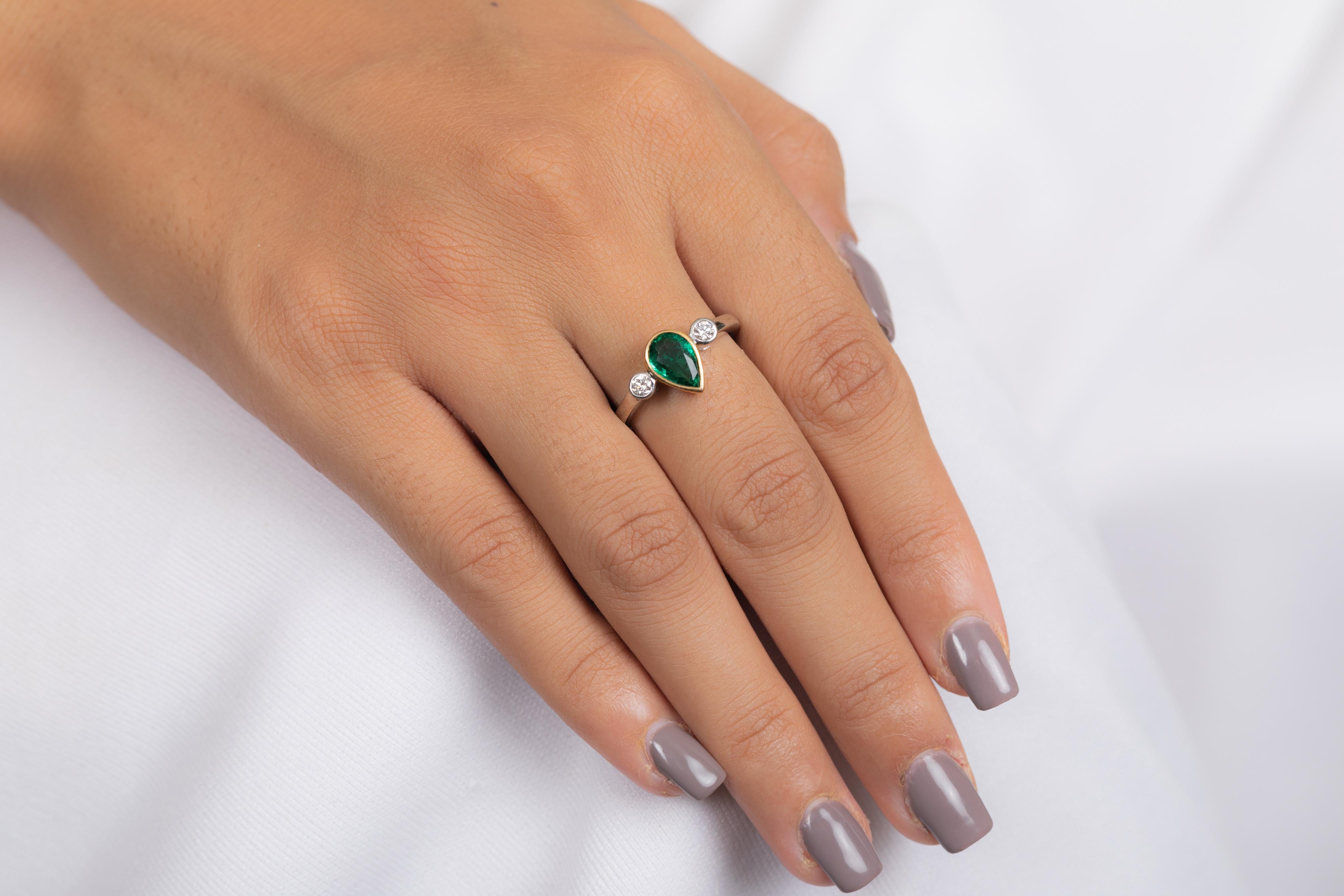 For Sale:  1.15 Carat Pear Shaped Emerald and Diamond Engagement Ring in 18k White Gold  9