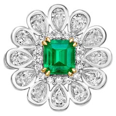 1.15 Carat Sunfiower Emerald Bridal Ring in 18KWYG with White Diamond.