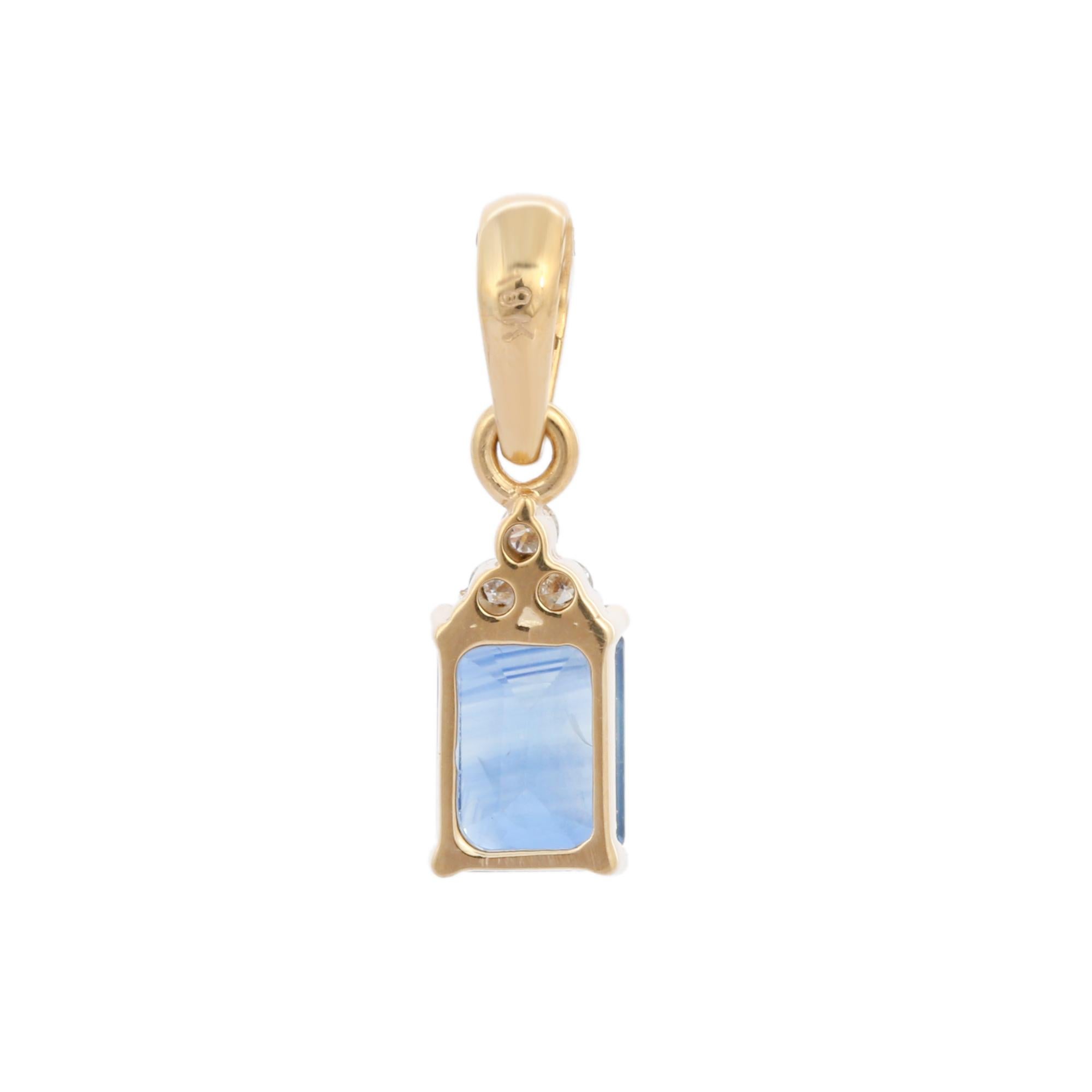 Modern 1.15 Ct Emerald Cut Blue Sapphire Pendant with Diamonds in 18K Yellow Gold For Sale