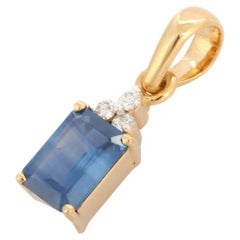 1.15 Ct Emerald Cut Blue Sapphire Pendant with Diamonds in 18K Yellow Gold