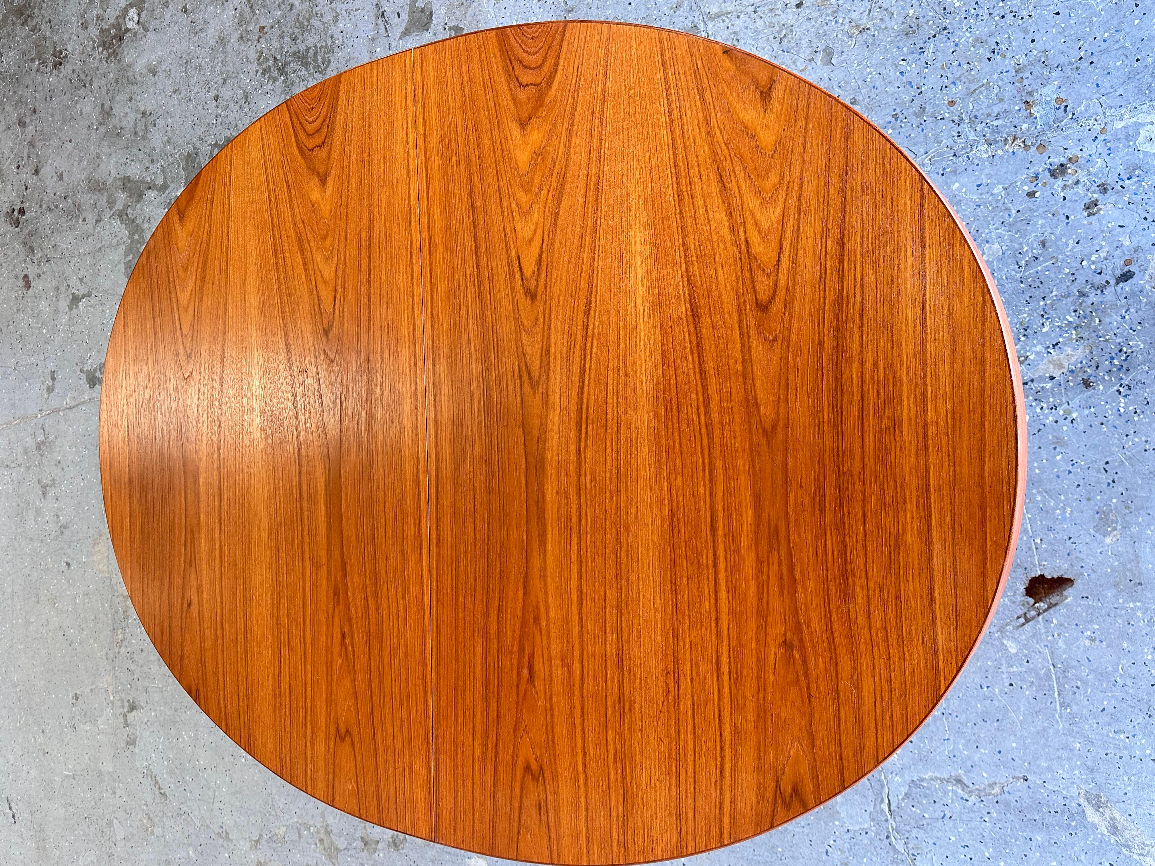 11.5 ft Teak Mid Century Danish Modern Harry Ostergaard Dining table seats 12 In Good Condition For Sale In Las Vegas, NV