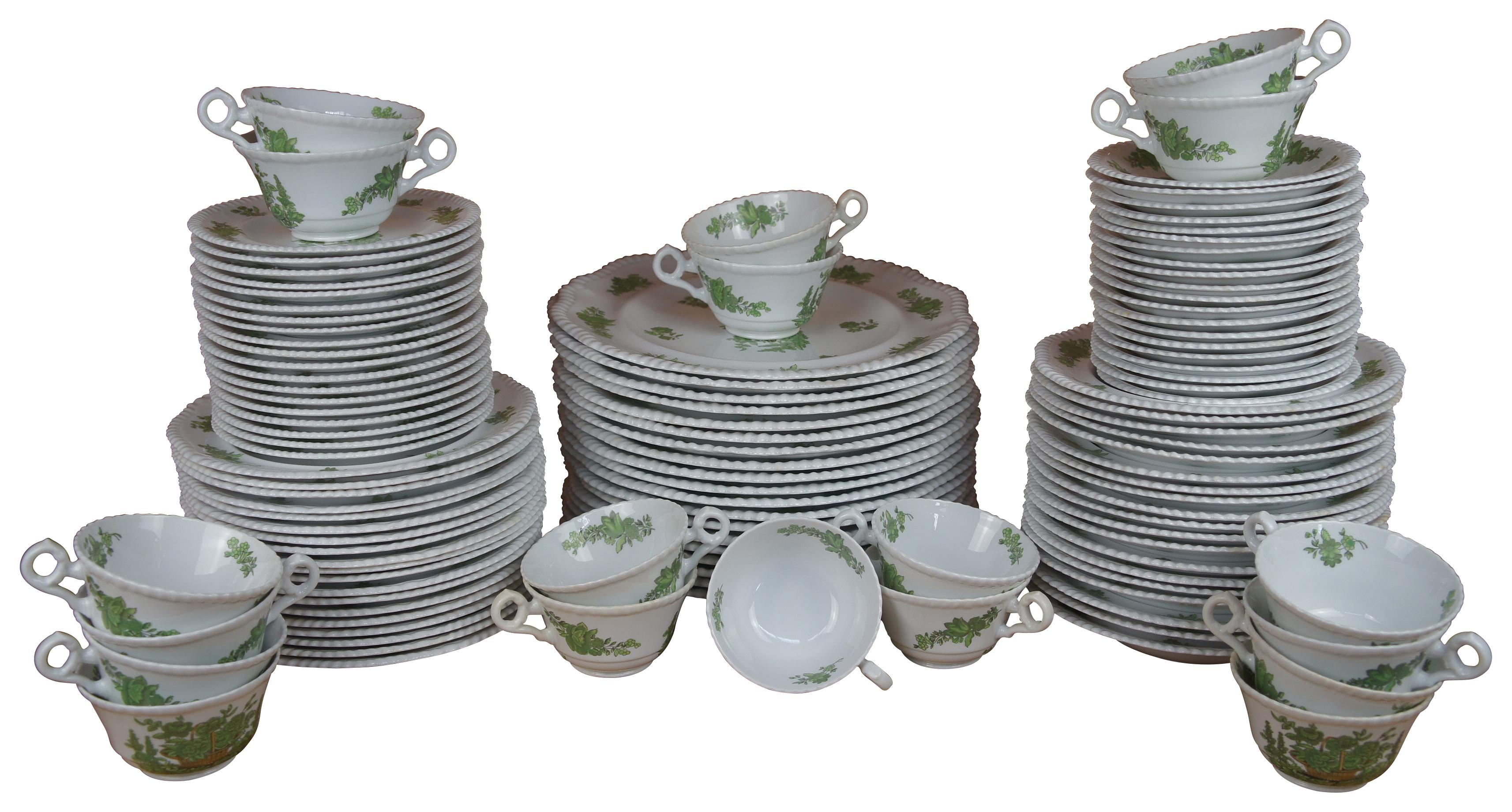 115 piece Antique England spode green basket pattern Bone China dinnerware set featuring a green floral bouquet of flowers with a scalloped / gadrooned edge. Includes dinner plates, salad plates, bread plates, bowls, tea / coffee cups and