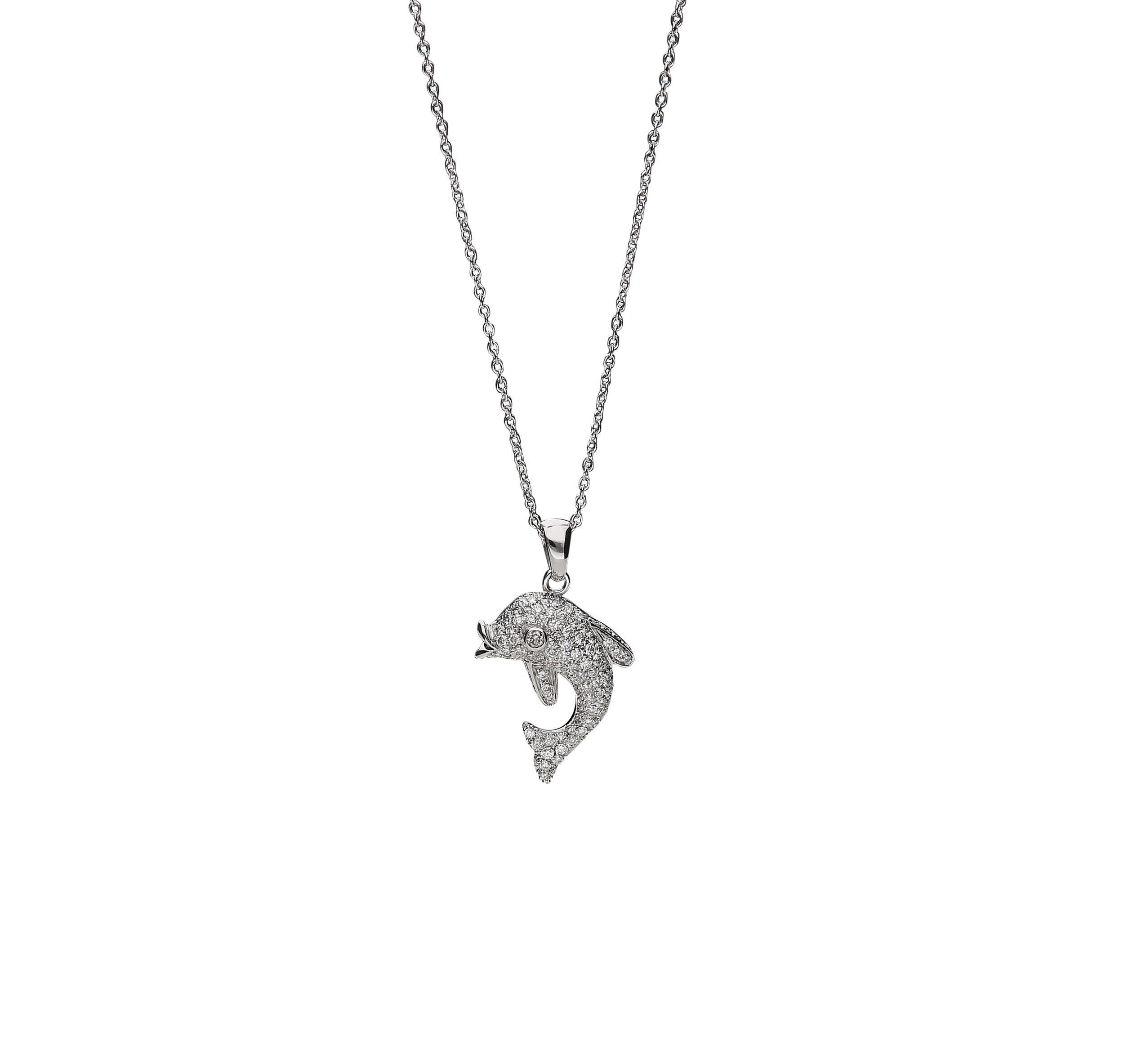 Cool domed dolphin pendant with a 74 centimeters long chain and white round brilliant diamonds color G clarity VS for 1,15 carats. 18kt white gold weight is 7,50 grams.
A so nice face for the dolphin that as symbol of freedom can be wear all year