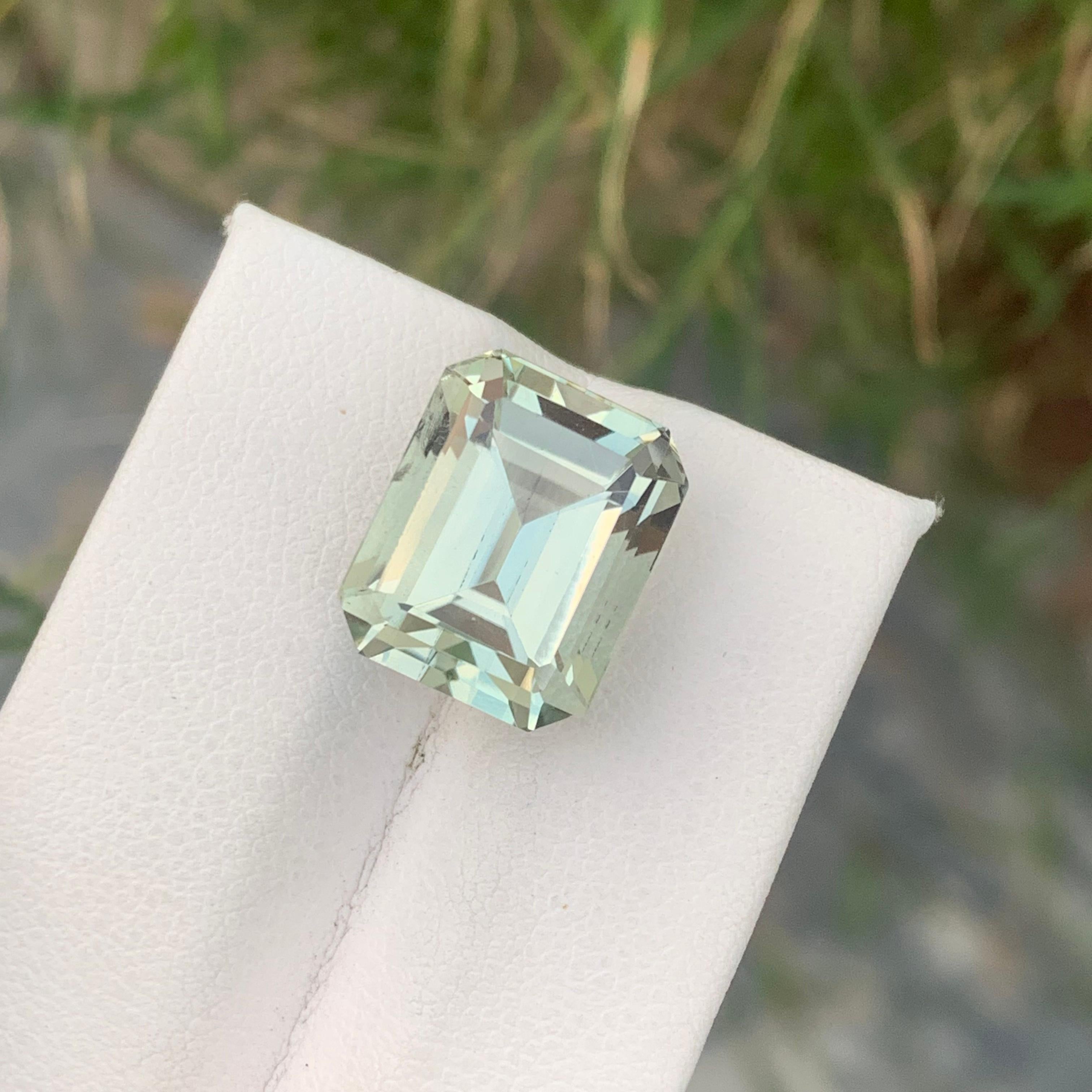 Faceted Green Amethyst 
Weight: 11.50 Carats
Dimension: 14.5x11.7x9.9 Mm
Origin: Brazil 
Shape: Emerald 
Cut/Facet: Asscher 
Color: Green 
Certificate: On Demand 
Green amethyst, also known as prasiolite, is a unique and captivating gemstone that
