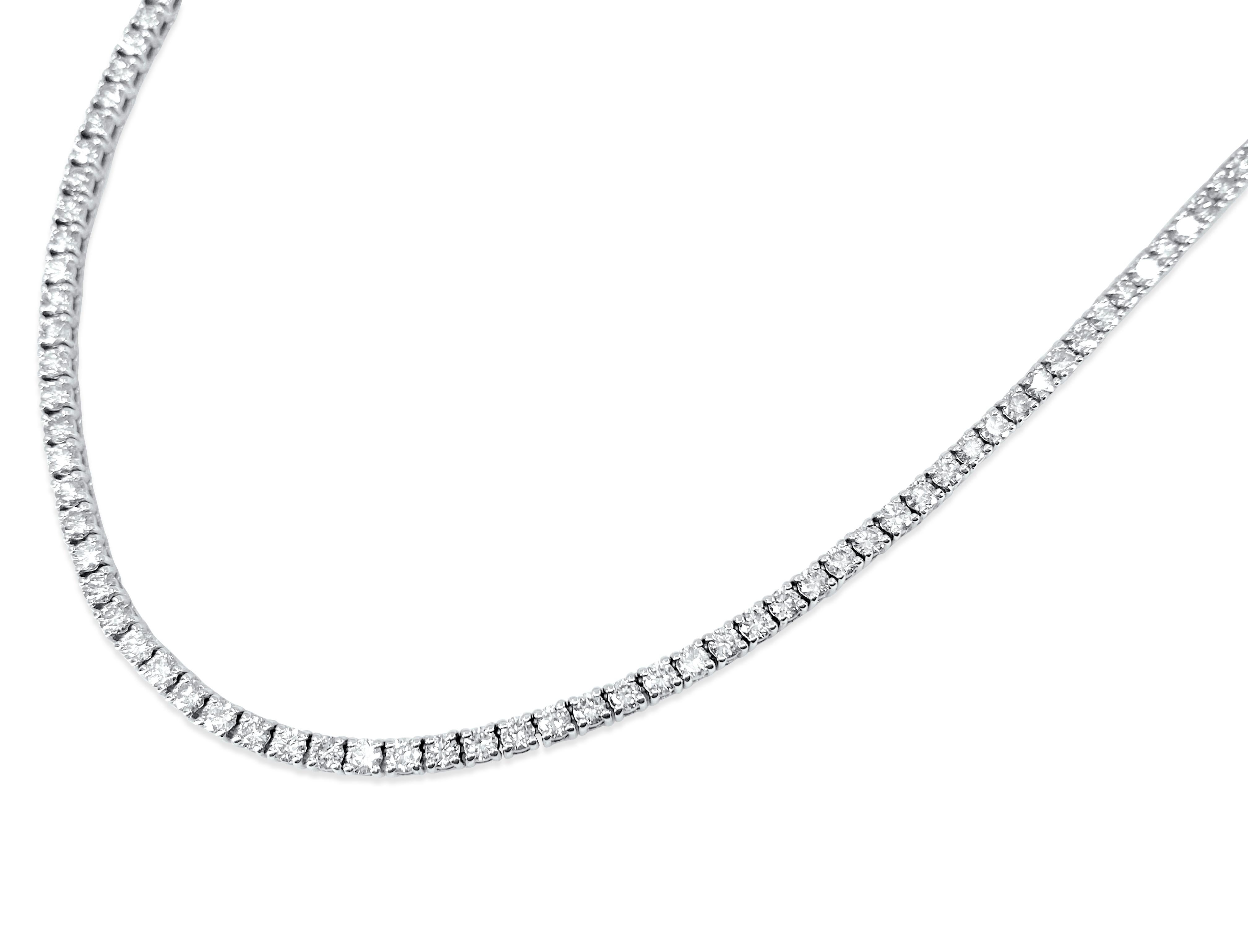 Fashioned from the finest 14k white gold, this stunning necklace showcases a total of 11.50 carats of diamonds with VVS-VS clarity and H color. Each diamond, sourced directly from the earth, adds unparalleled brilliance and elegance to the piece.
