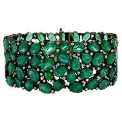 115.21 Ct Zambian Emerald studded Contemporary Statement Bracelet in 18K Gold