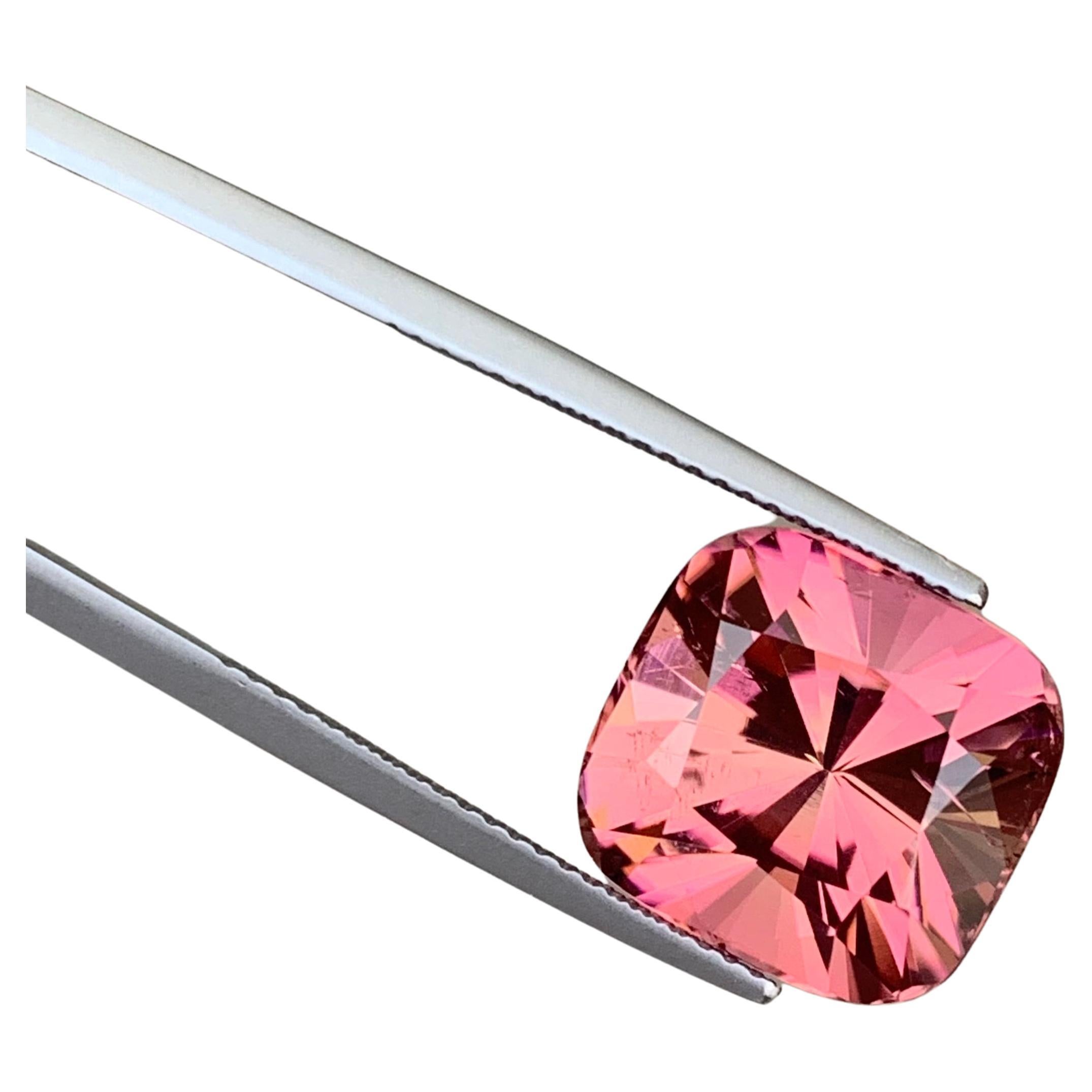 Faceted Tourmaline 
Weight: 11.55 Carats 
Dimension: 13.2x12.4x10.4 Mm
Origin: Afghanistan 
Color:  Pink
Shape: Cushion
Clarity: Eye Clean
Certificate: On Demand 
With a rating between 7 and 7.5 on the Mohs scale of mineral hardness, tourmaline