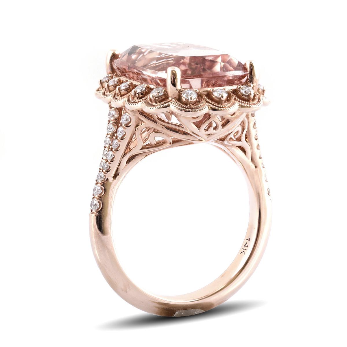 A lovely gemstone set in rose gold, this 11.55 carat mystical Morganite adds a touch of fresh sexiness to this ring. Set in 14K gold, there will be no denying the durability of this ring paired with the everlasting salmon colored beryl. Although