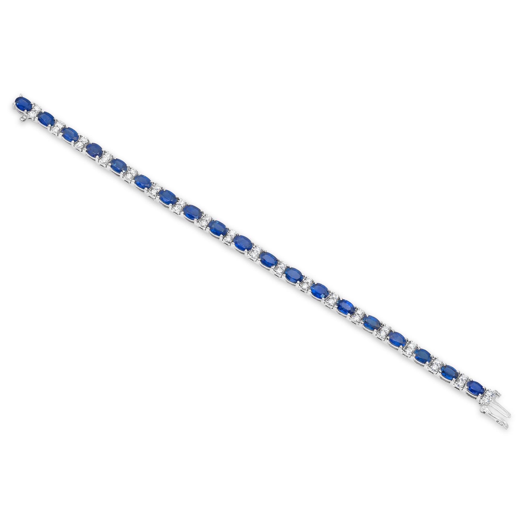 A beautiful tennis bracelet, featuring an alternating style of 19 oval cut blue sapphires weighing 11.56 carats total and 38 round cut diamonds weighing 1.27 carats total. Finely made with 18K white gold, 6.75 inches in length. Perfect for casual or