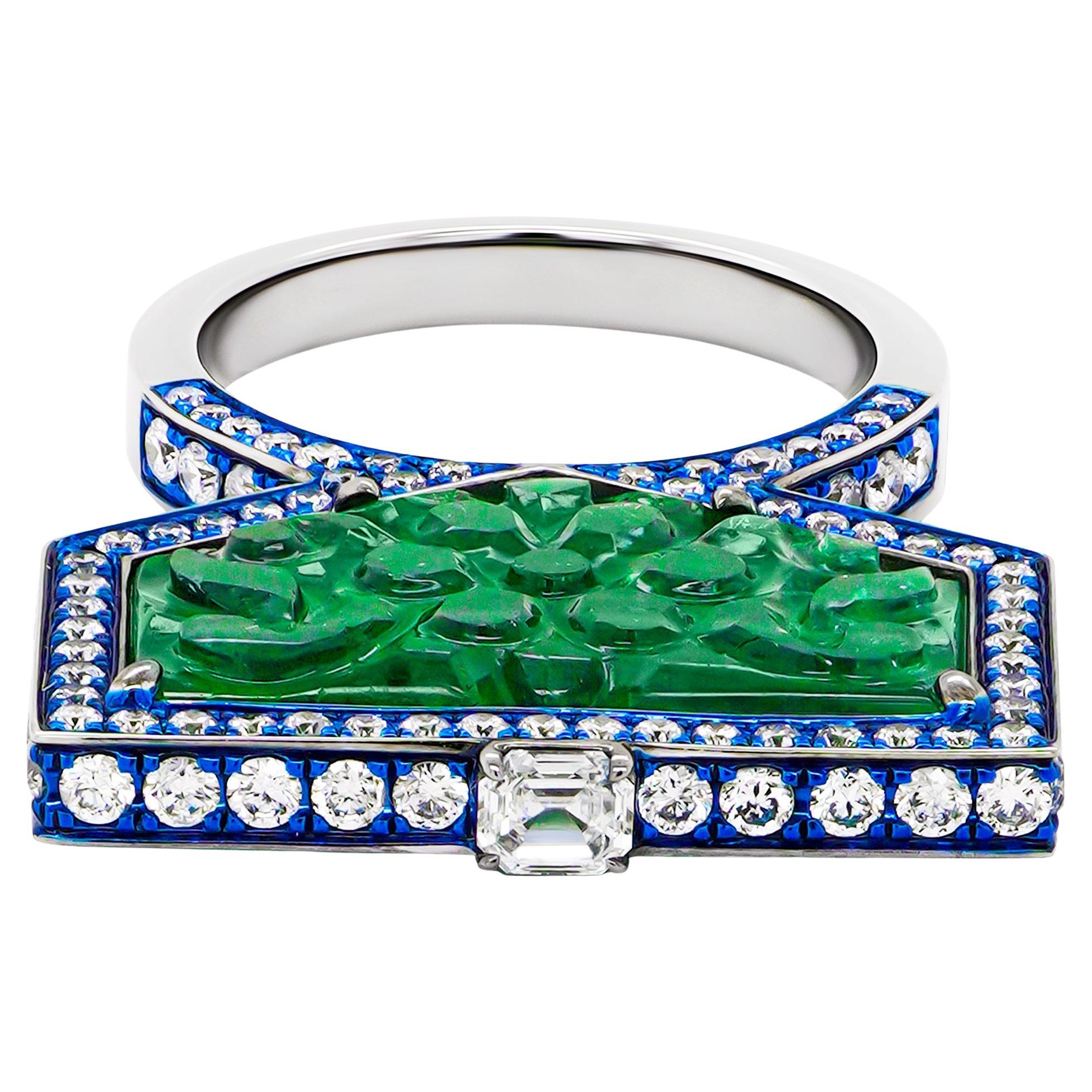 This extraordinary 18K gold ring is a true testament to luxury and regal elegance, showcasing an 11.57-carat vivid green emerald carving and 1.70 carats of brilliant white diamonds. Designed to embody opulence and timeless beauty, this piece is a